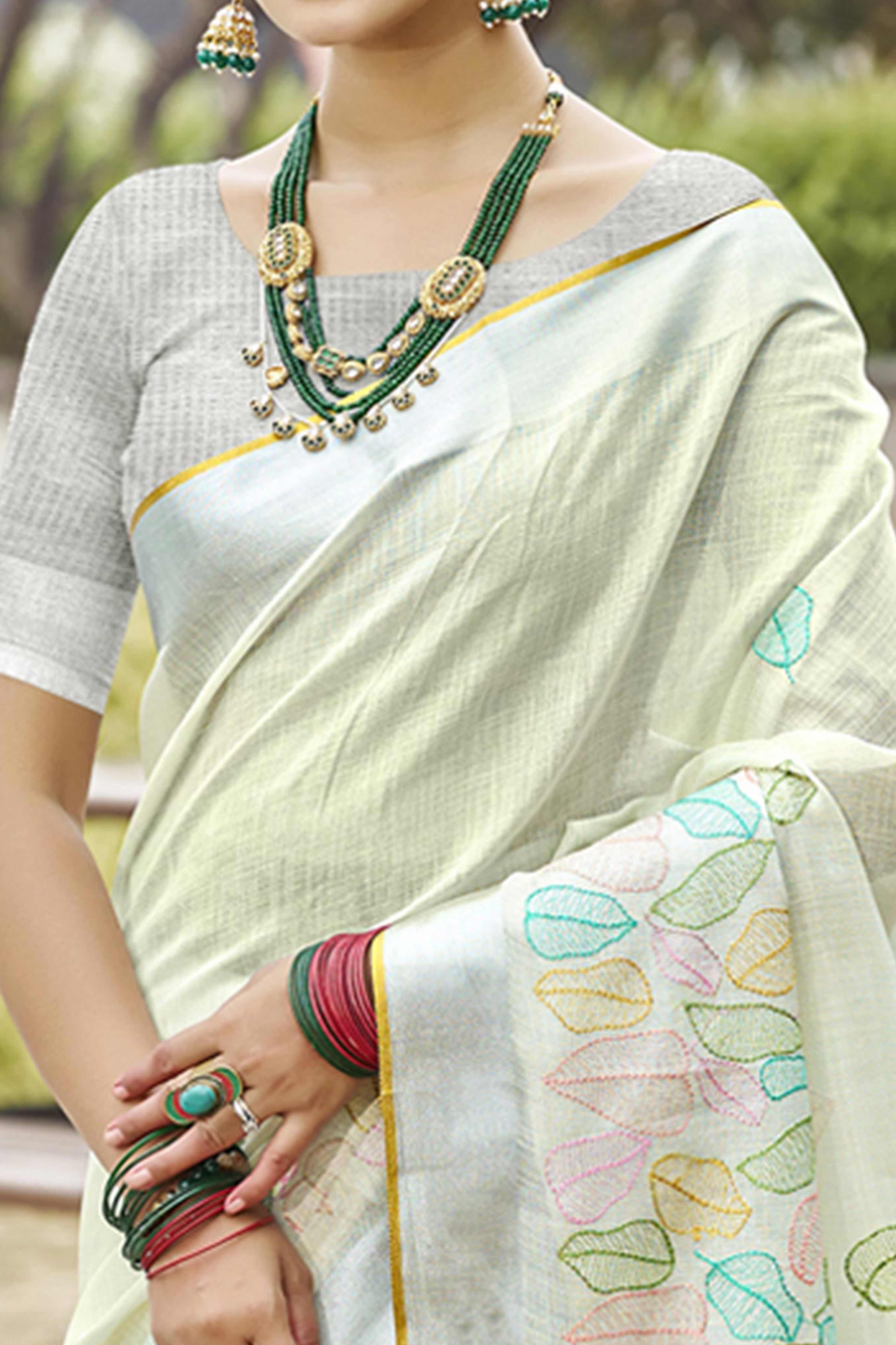 Classic Offwhite Leaf Pattern Thread Embroidery Work Linen Saree With Tassel Pallu