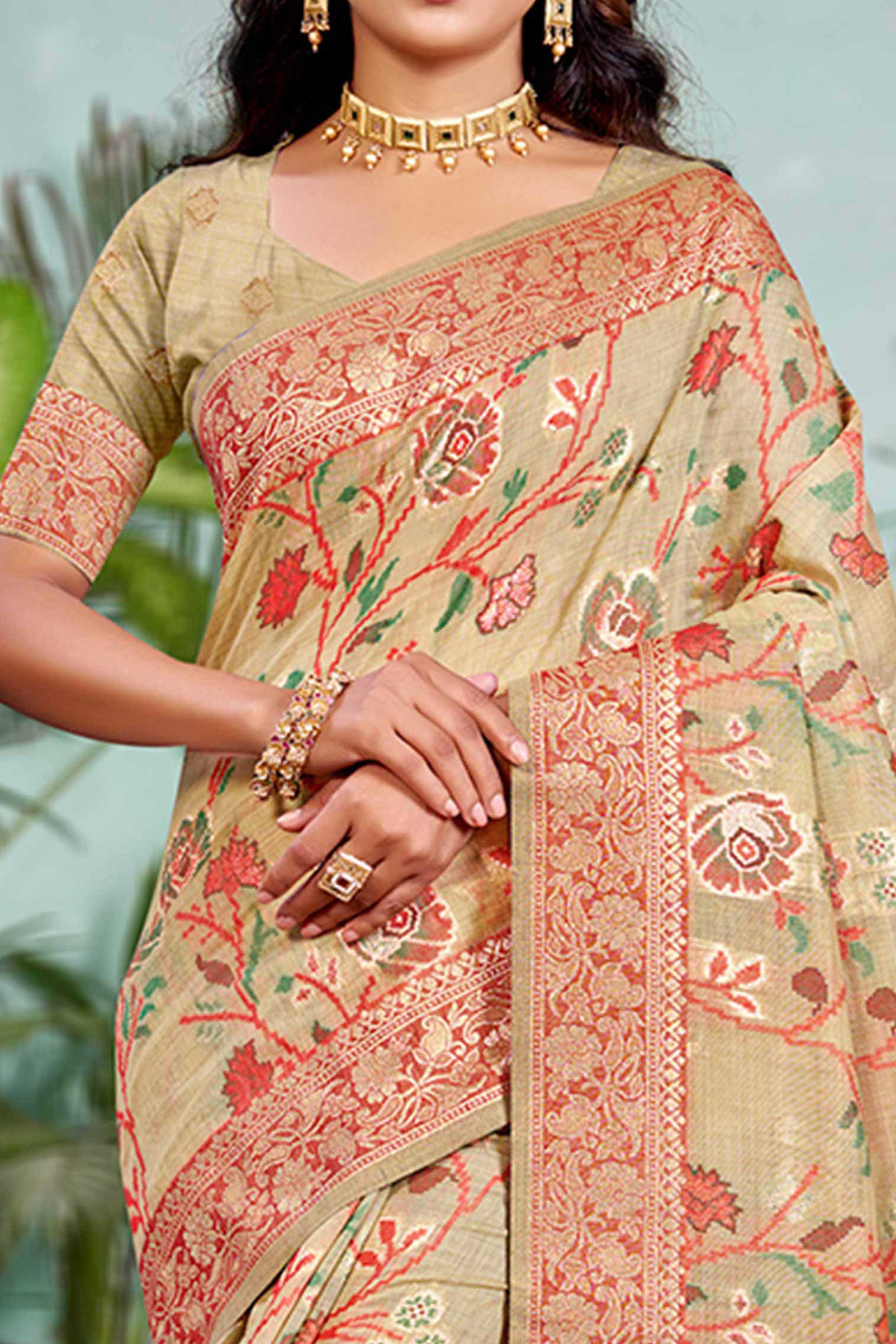 Captivating Beige Floral Zari Weaving Cotton Silk Saree Accented With Tassel Pallu