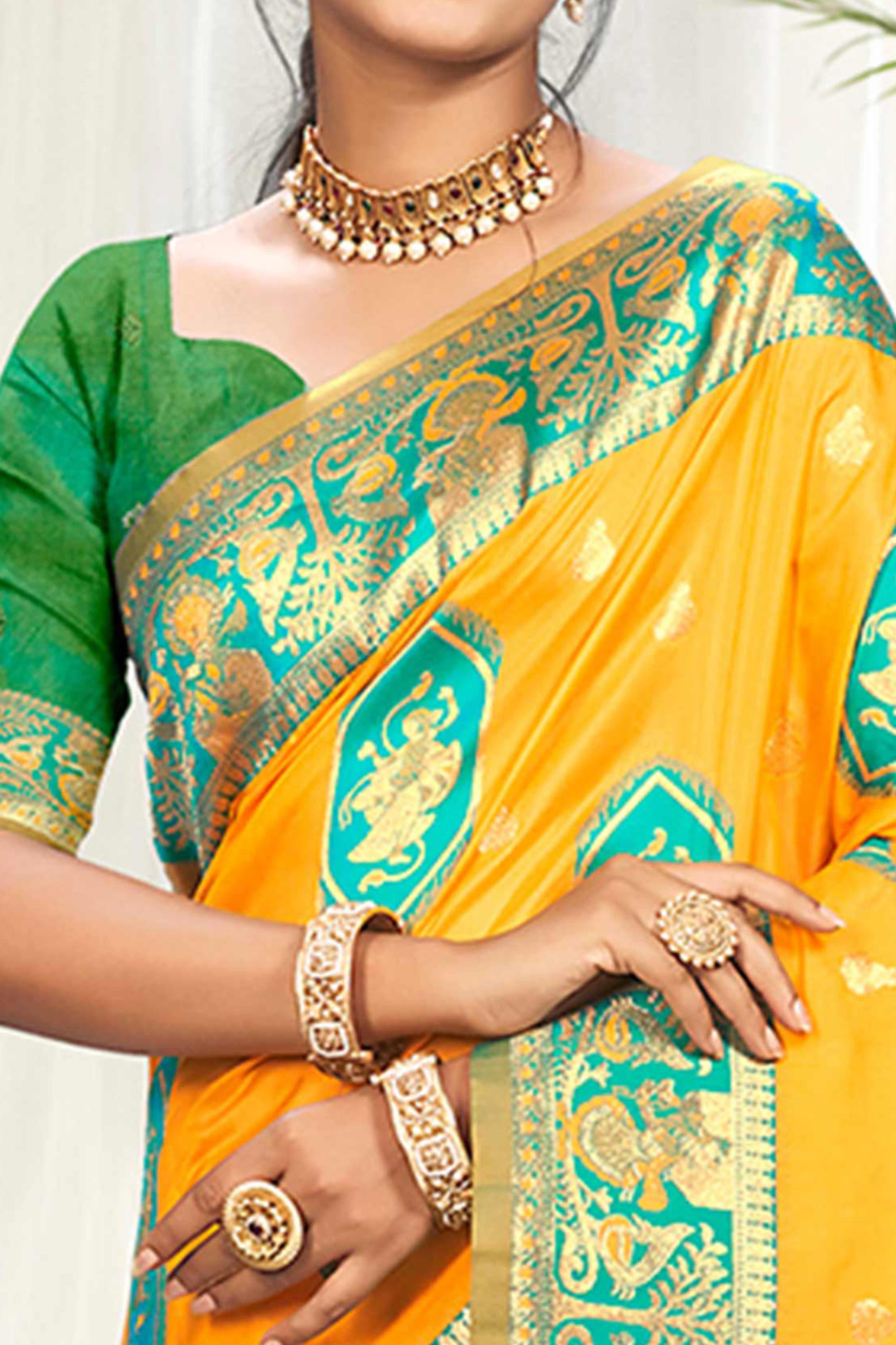 Mesmerizing Mustard Traditional style Weaving Silk Blend Saree With Graceful Tassel Pallu