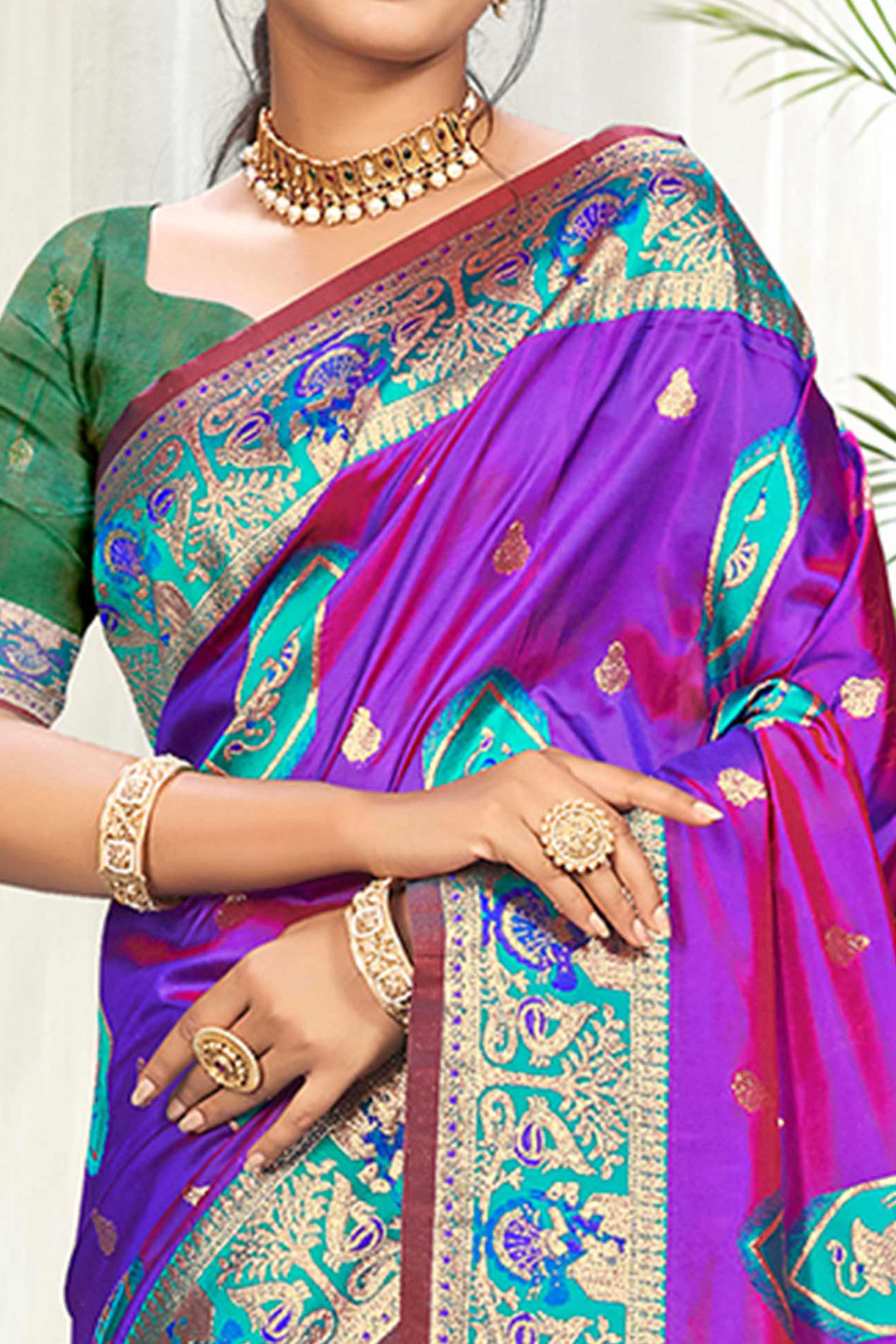 Mesmerizing Purple Traditional style Weaving Silk Blend Saree With Graceful Tassel Pallu