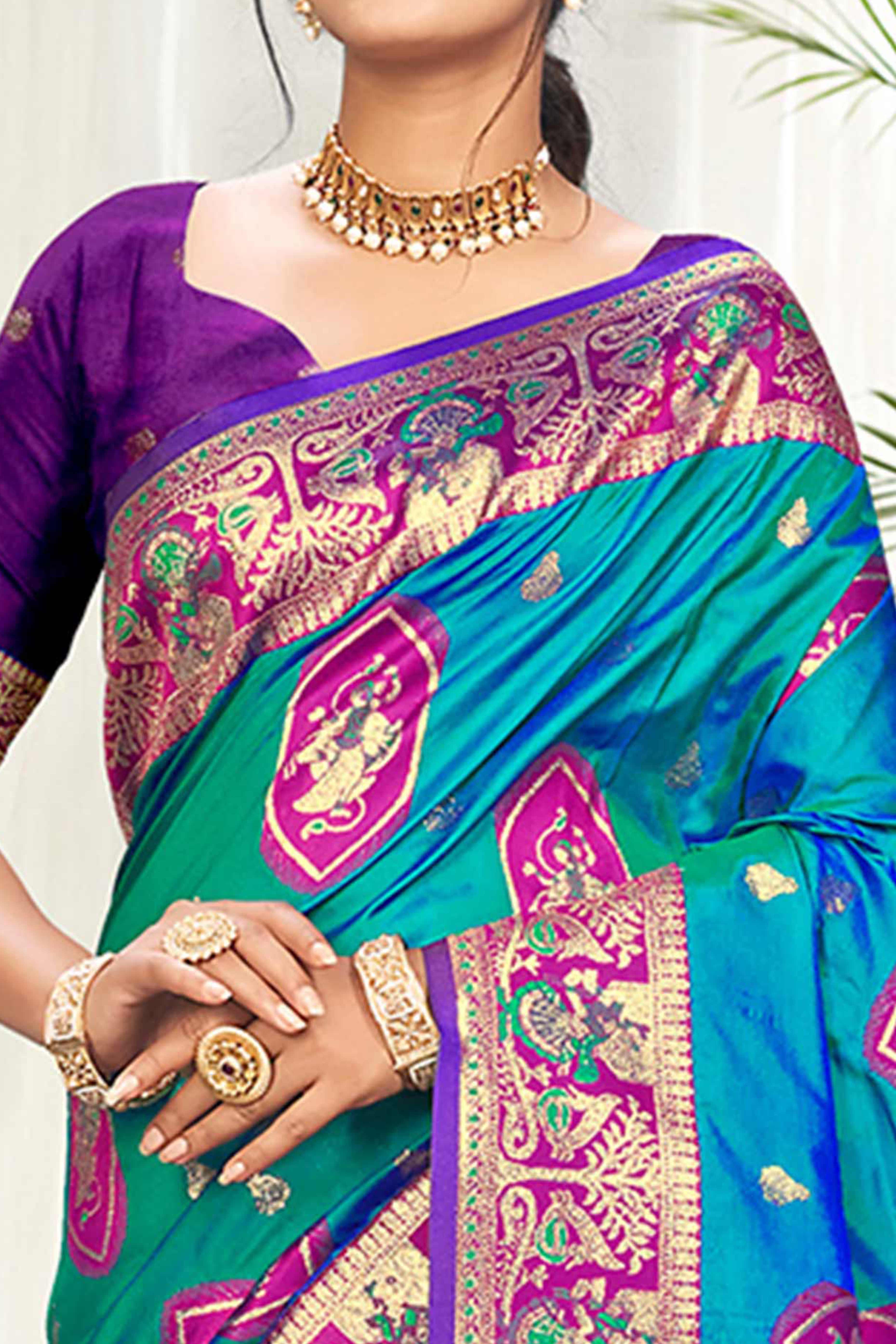 Mesmerizing Morpich Blue Traditional style Weaving Silk Blend Saree With Graceful Tassel Pallu