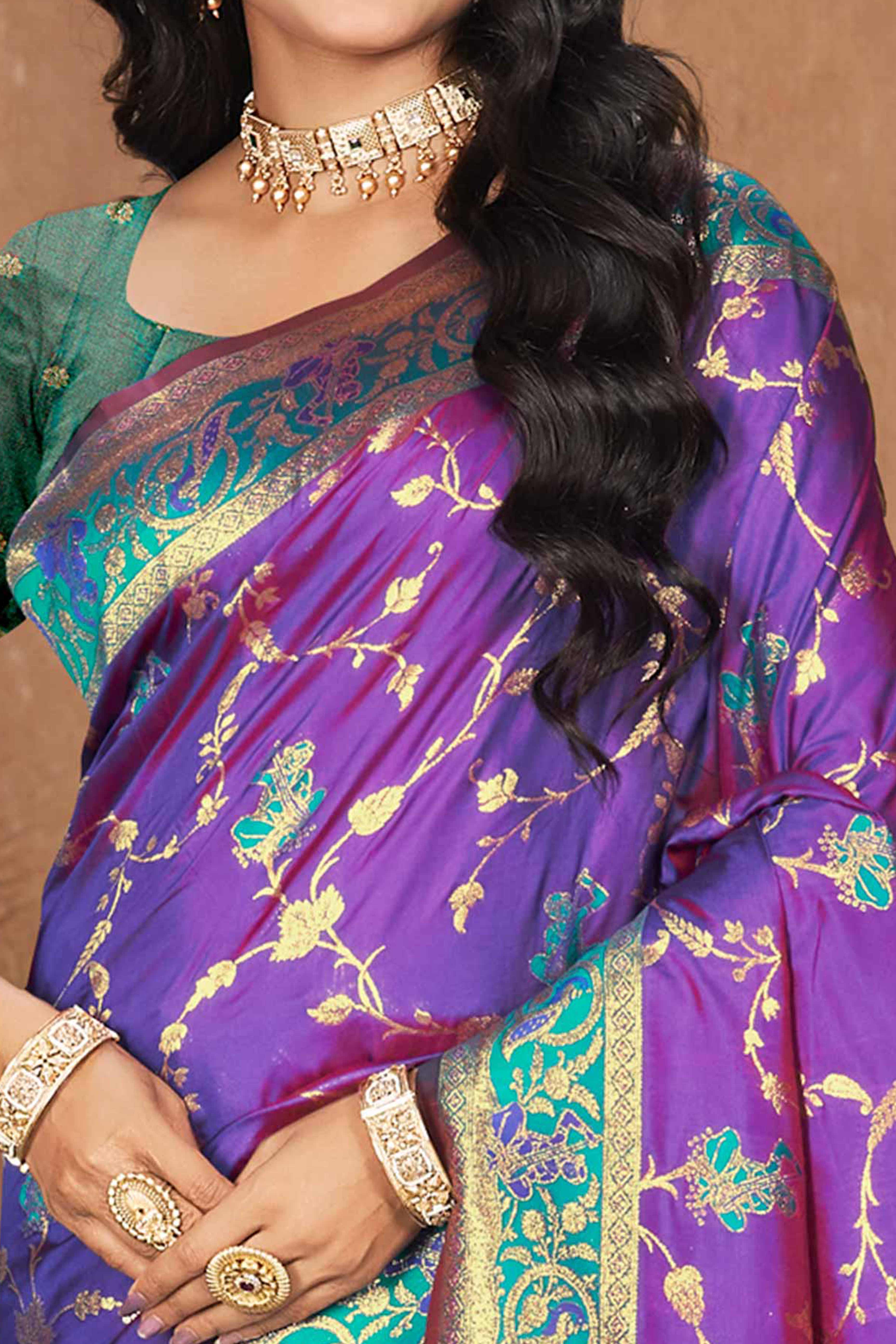 Radiant Purple Floral Zari Weaving Silk Blend Saree With Tassel Pallu