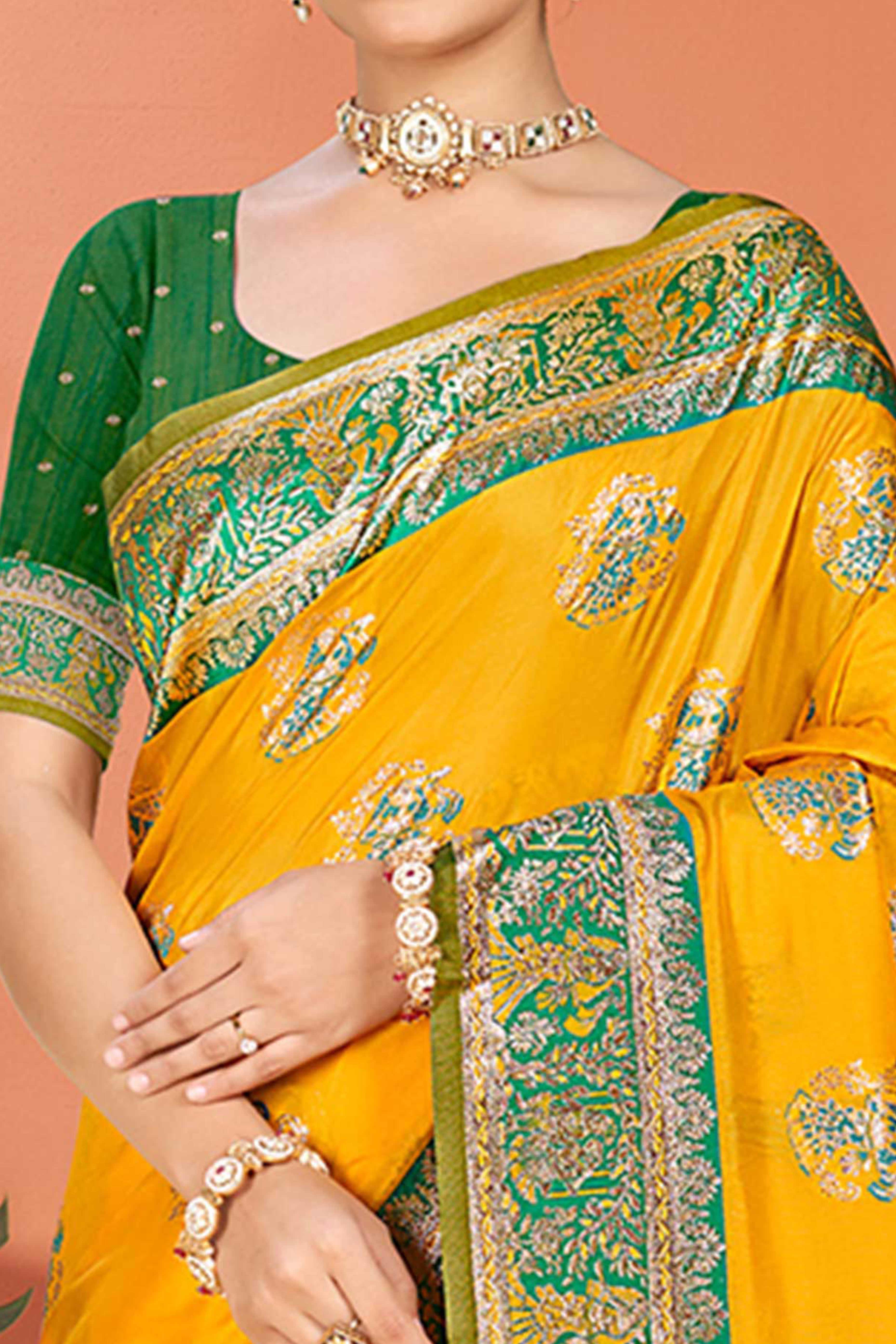 Mustard Traditional Zari Weaving Silk Blend Saree Accented With Tassel Pallu