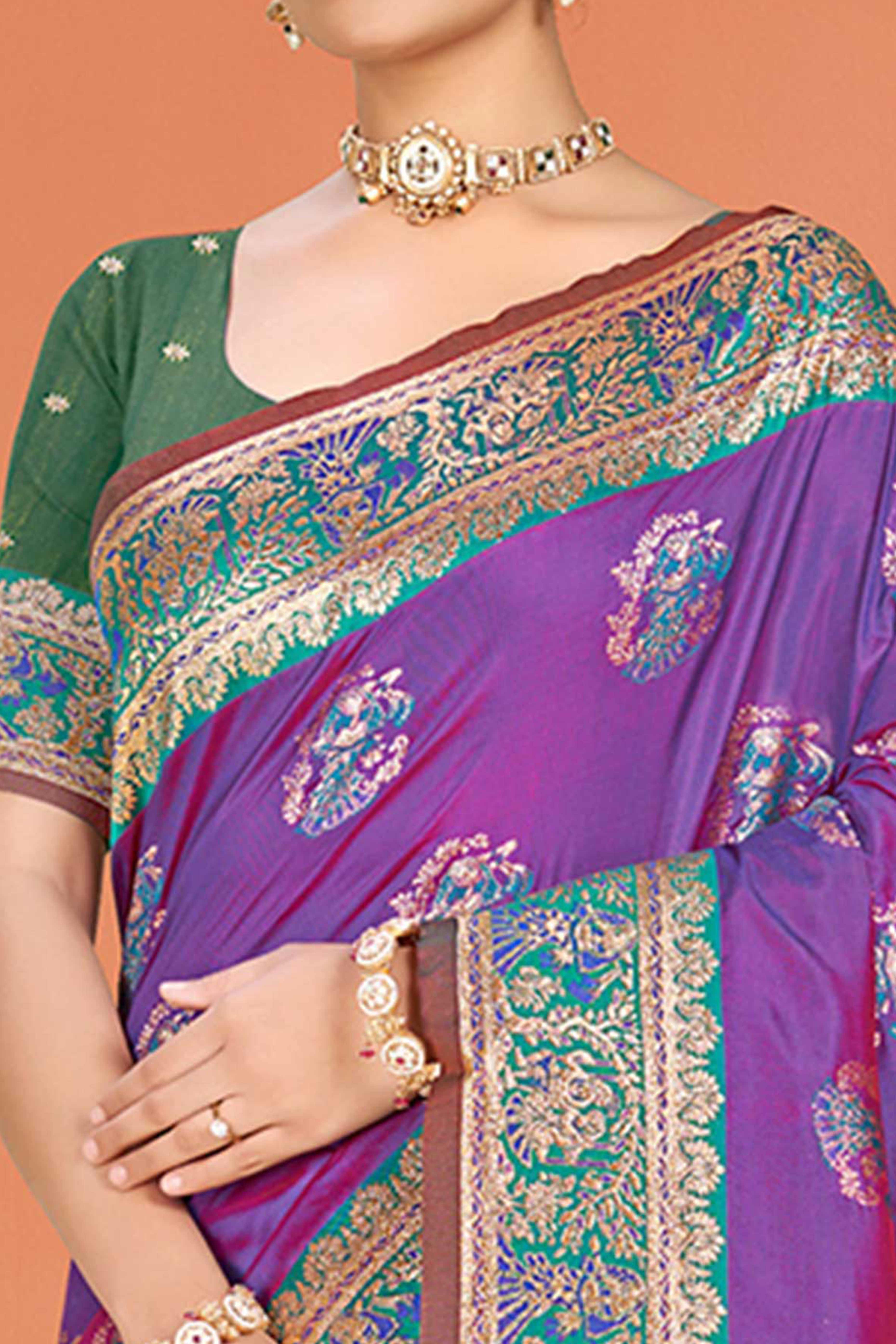 Purple Traditional Zari Weaving Silk Blend Saree Accented With Tassel Pallu