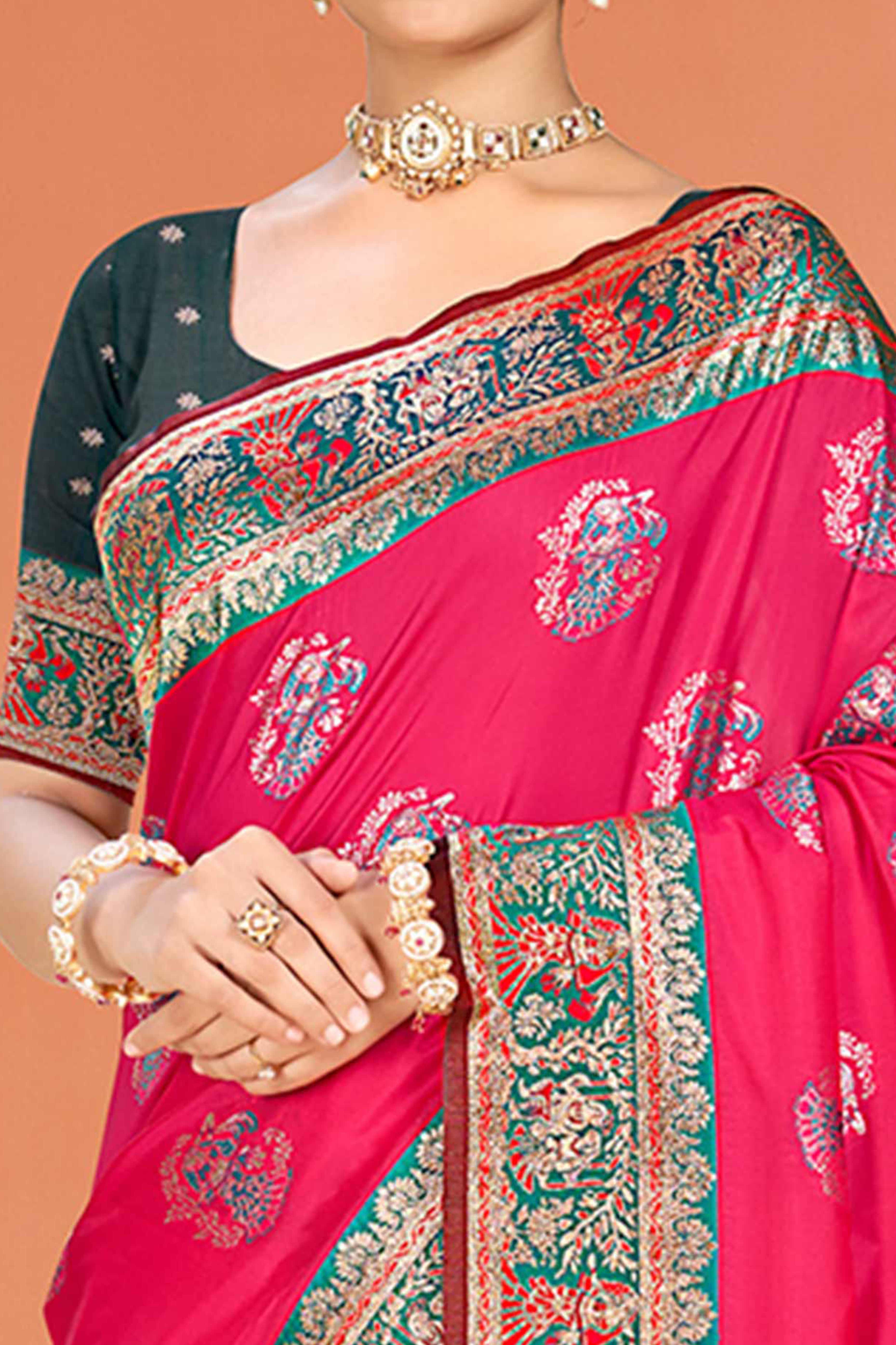 Pink Traditional Zari Weaving Silk Blend Saree Accented With Tassel Pallu
