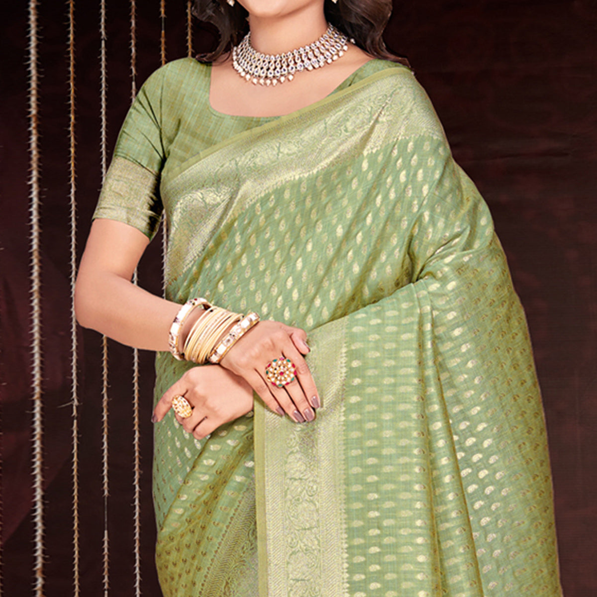 Green Floral Woven Cotton Silk Saree With Tassels