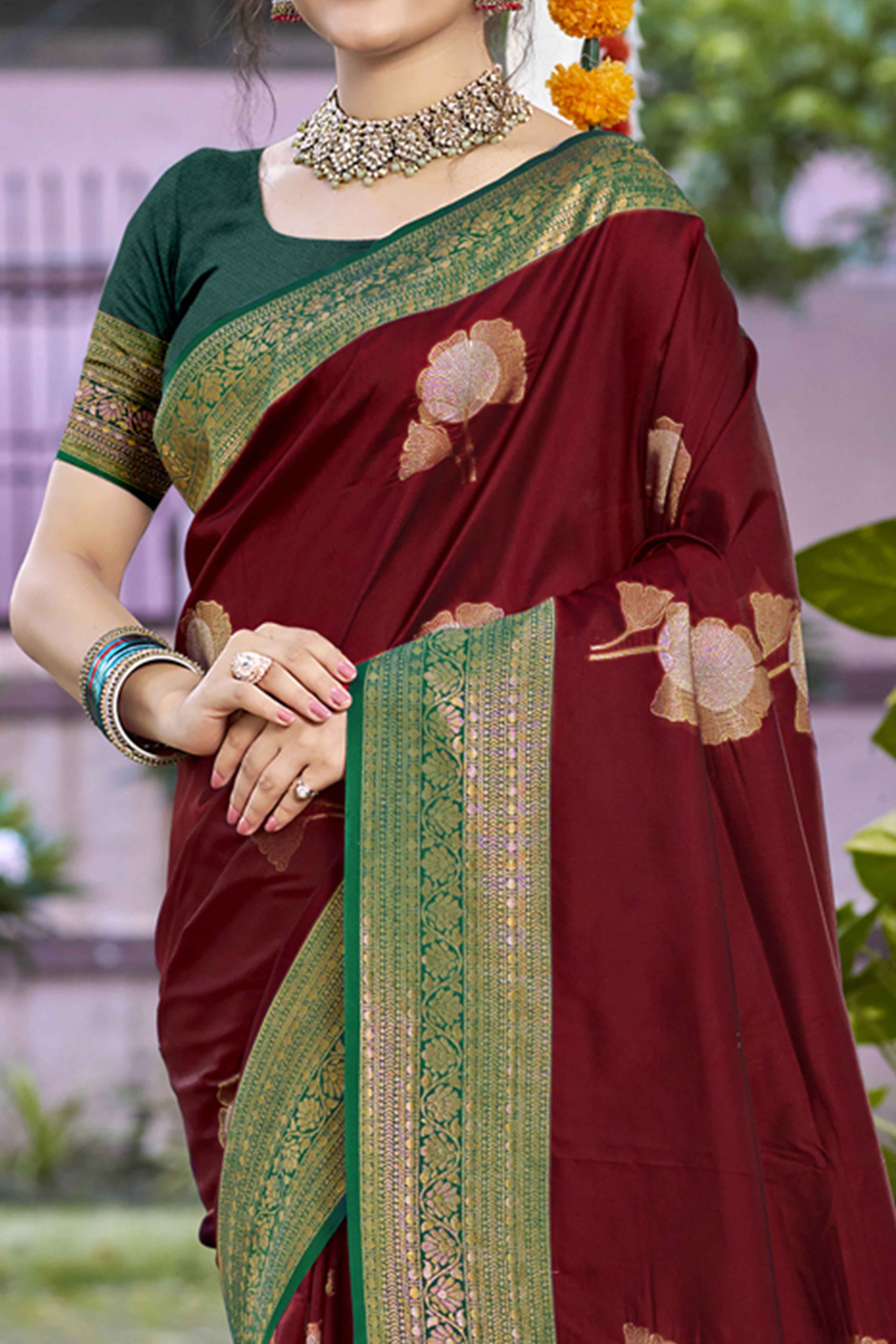 Maroon Floral Woven Banarasi Silk Saree With Tassels