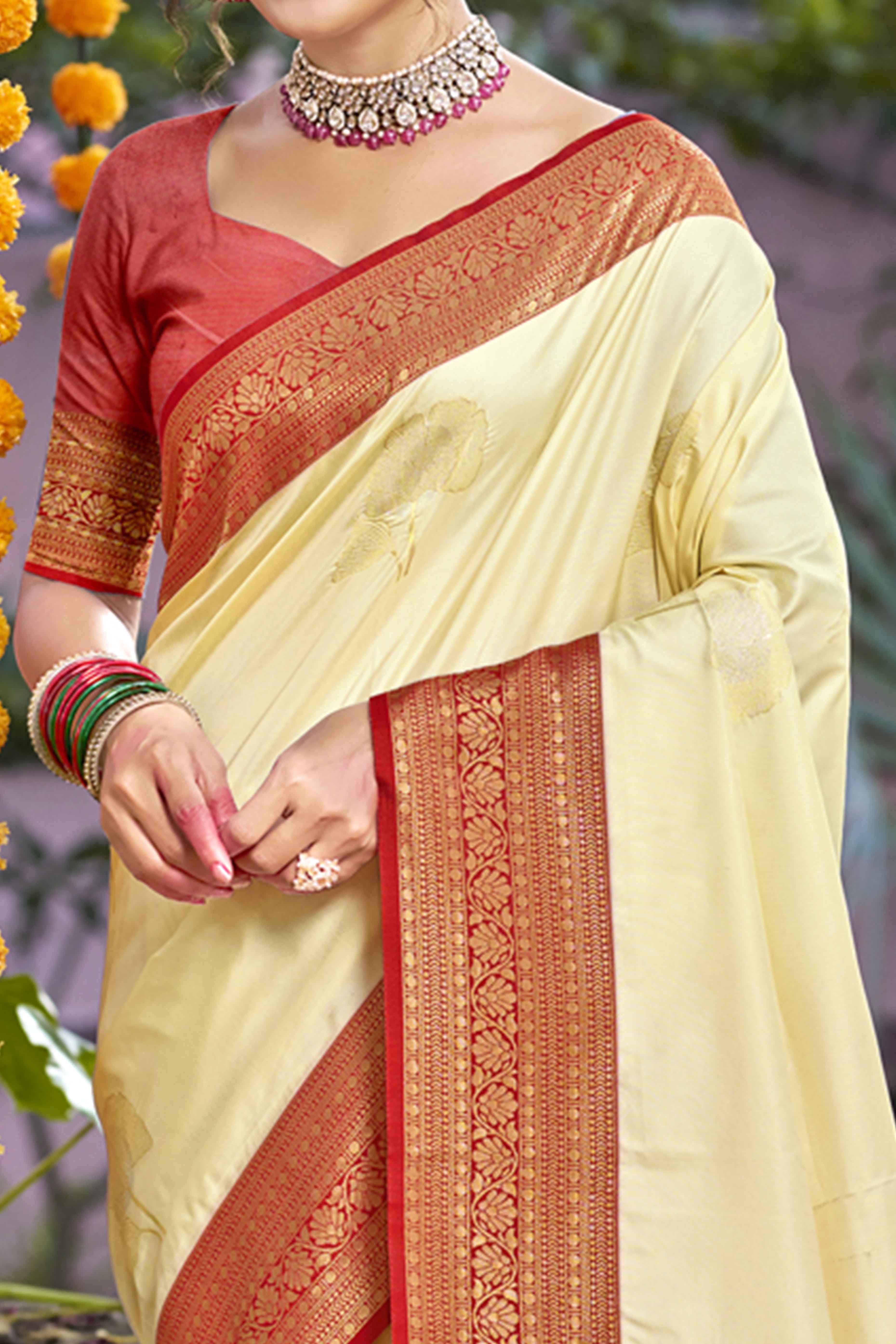 Cream Floral Woven Banarasi Silk Saree With Tassels