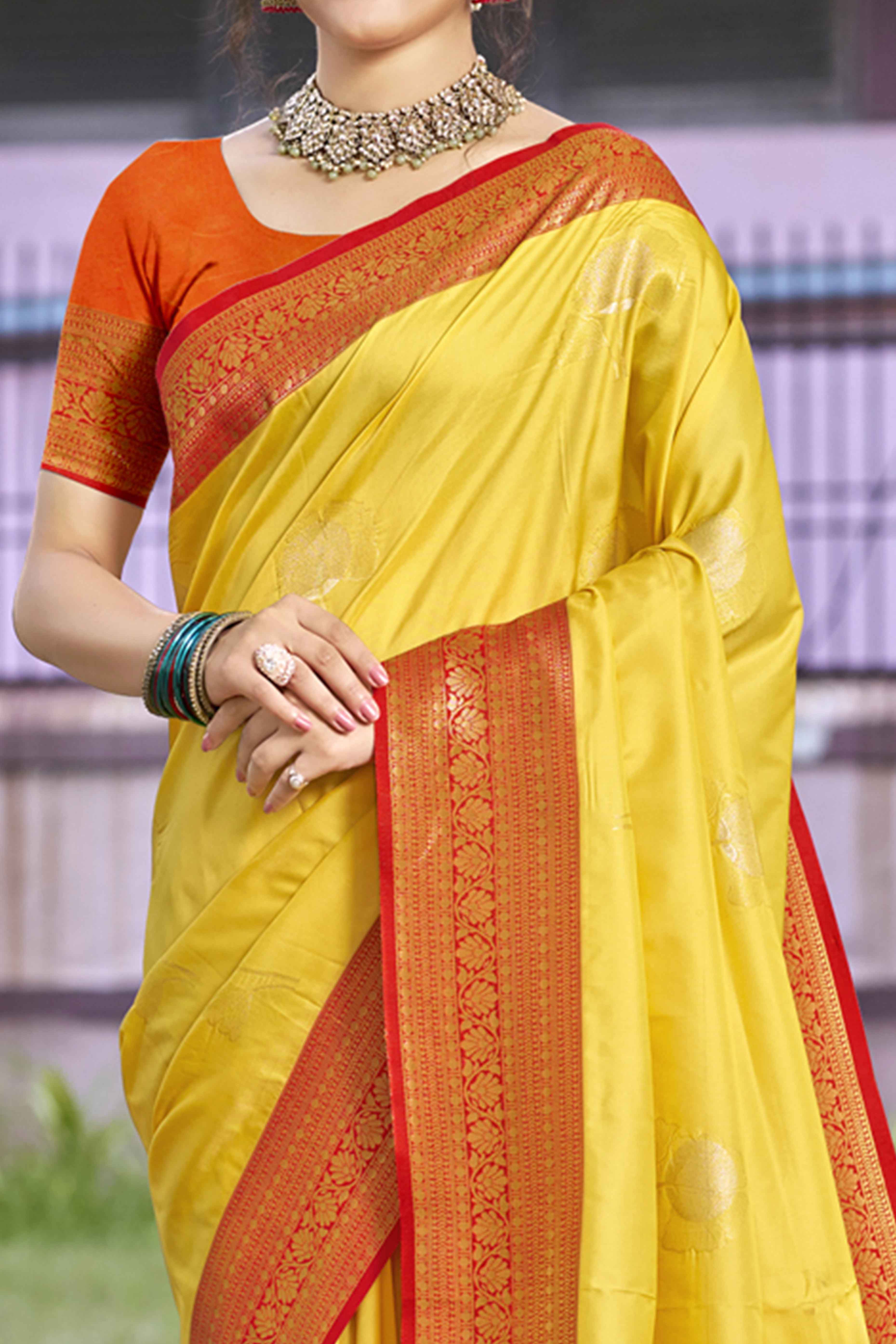 Yellow Floral Woven Banarasi Silk Saree With Tassels