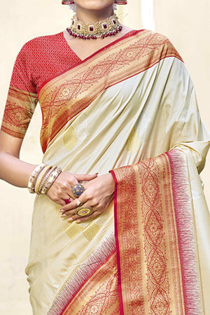 Cream Woven Banarasi Silk Saree With Tassels