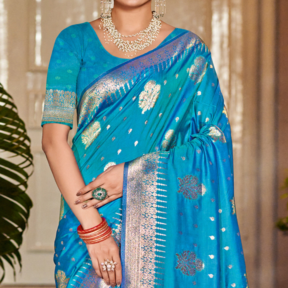 Blue Floral Woven Banarasi Silk Saree With Tassels