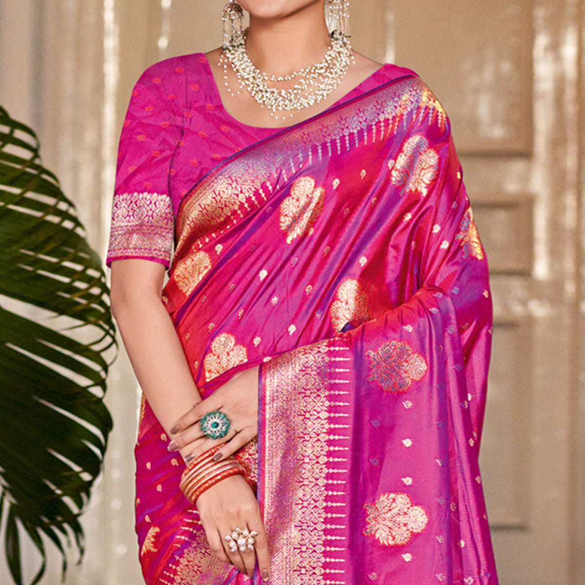 Rani Pink Floral Woven Banarasi Silk Saree With Tassels