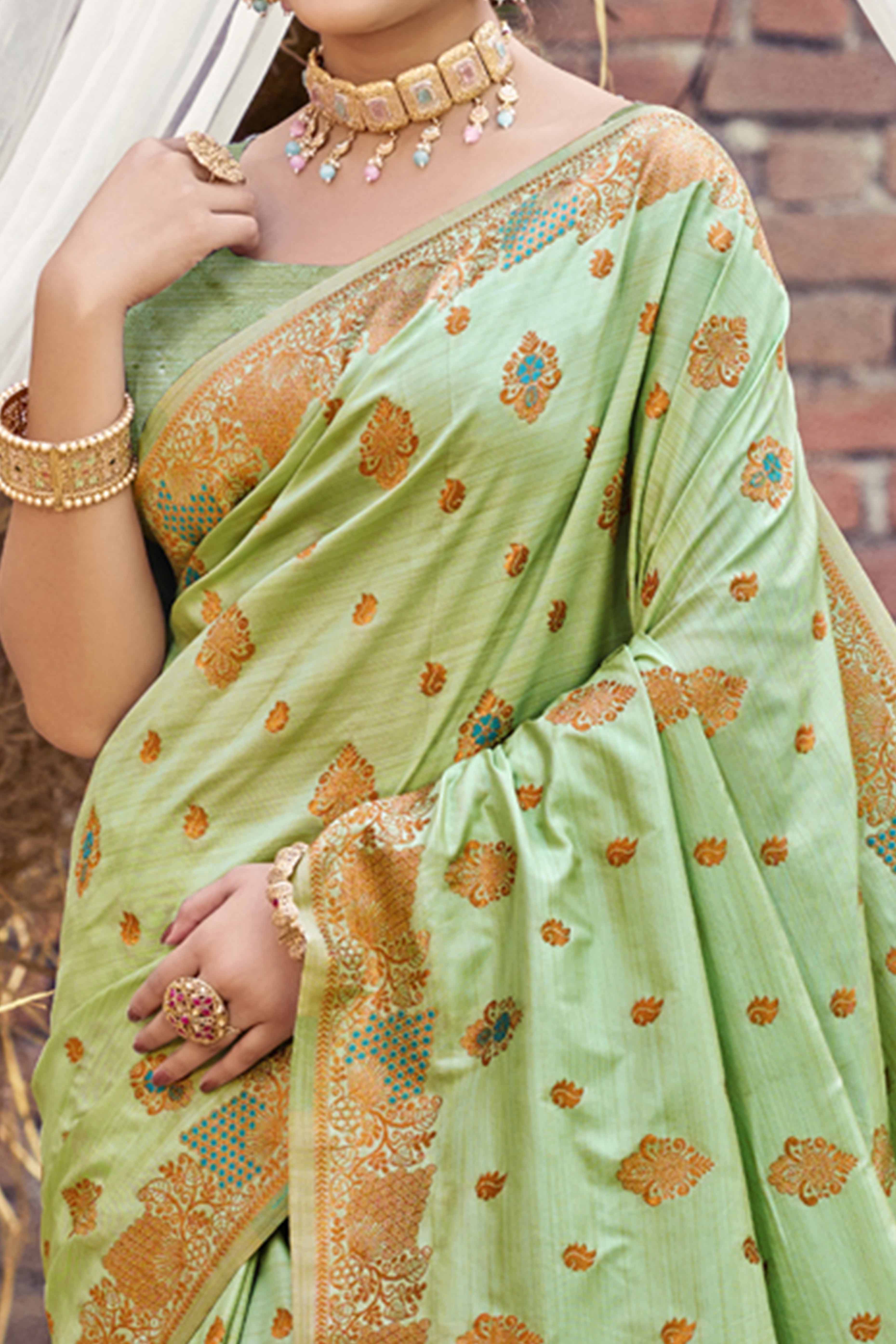Green Banarasi Silk Saree Adorned With Woven Zari Floral Motifs