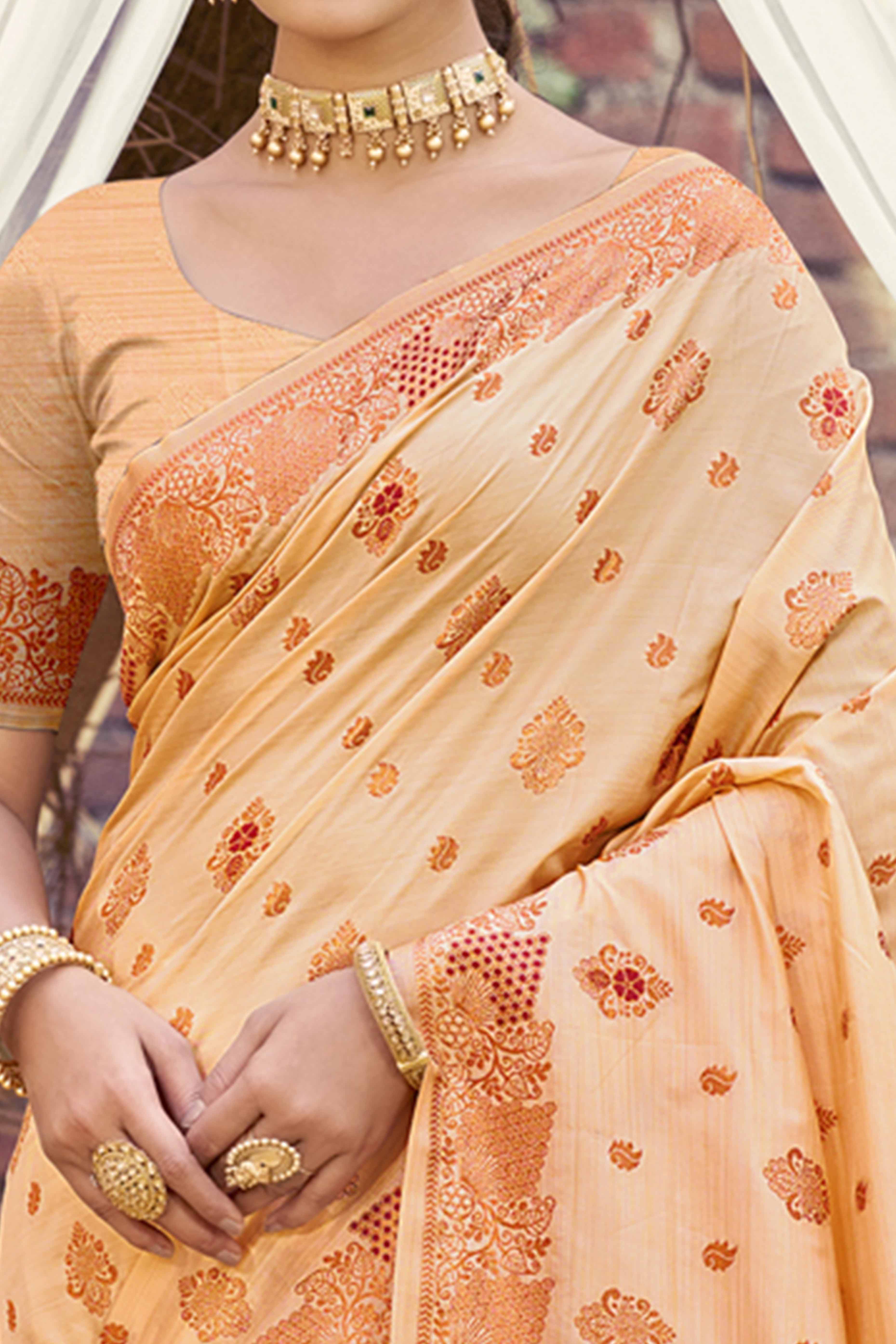 Peach Banarasi Silk Saree Adorned With Woven Zari Floral Motifs
