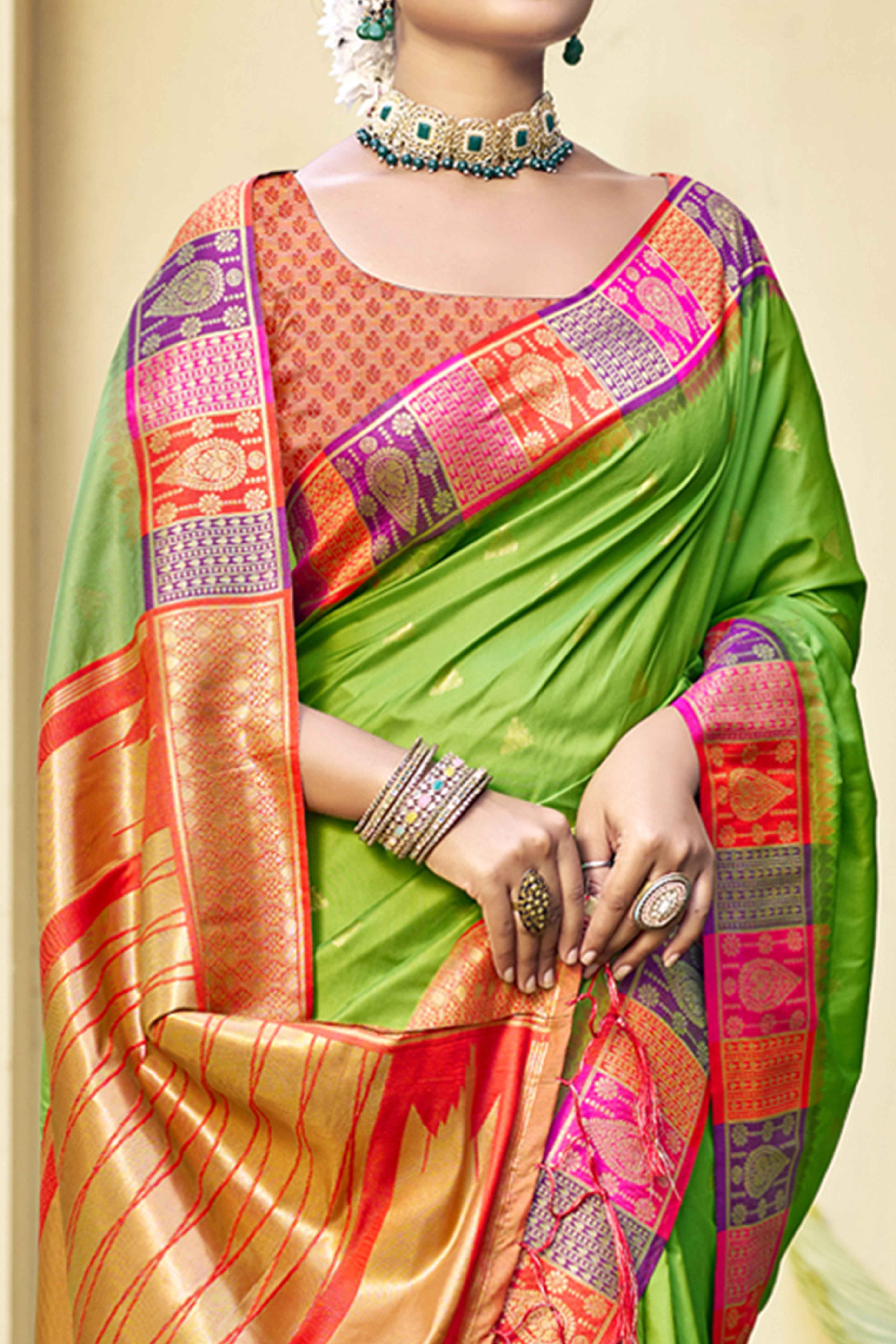 Green Woven Banarasi Silk Saree With Tassels