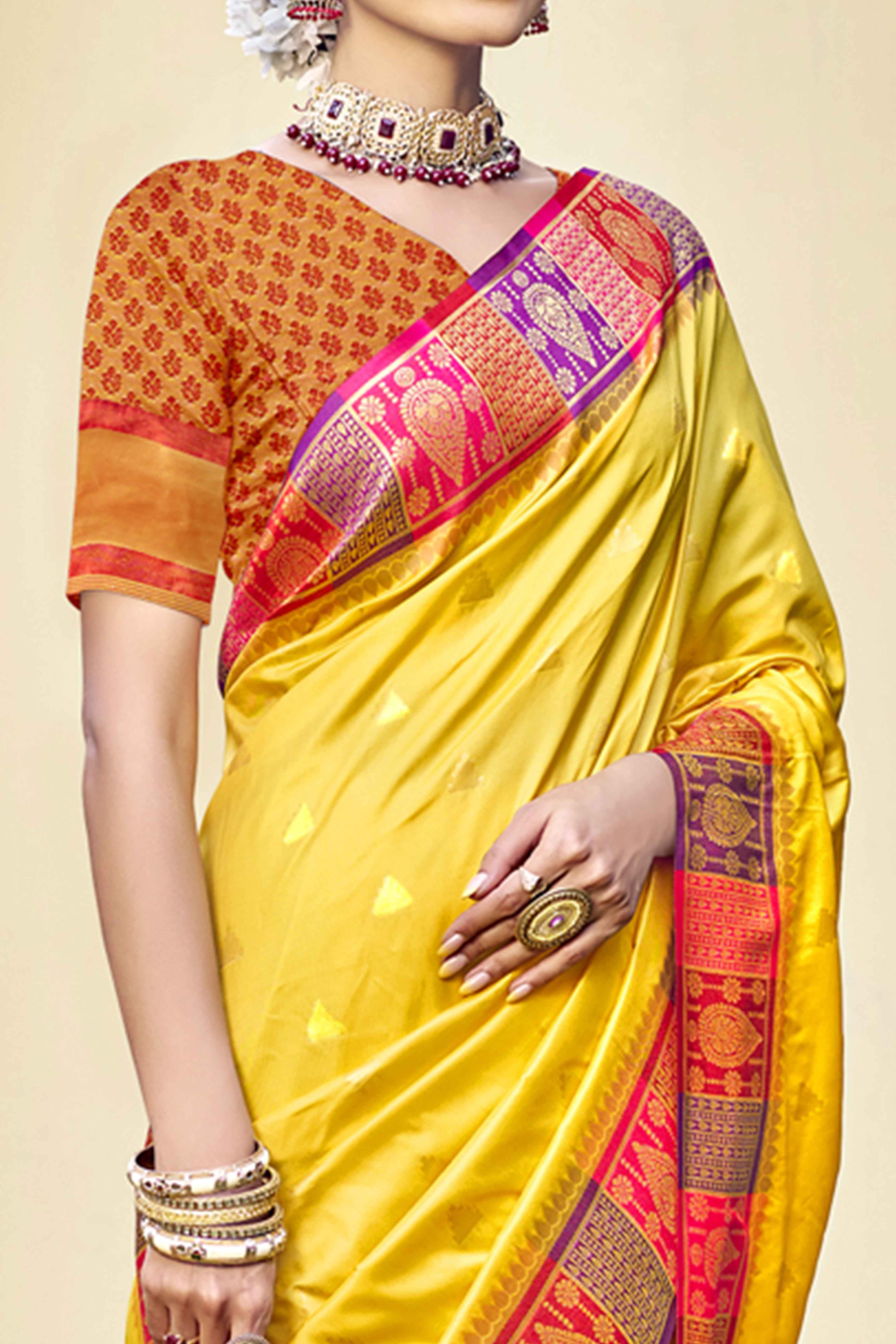 Yellow Woven Banarasi Silk Saree With Tassels