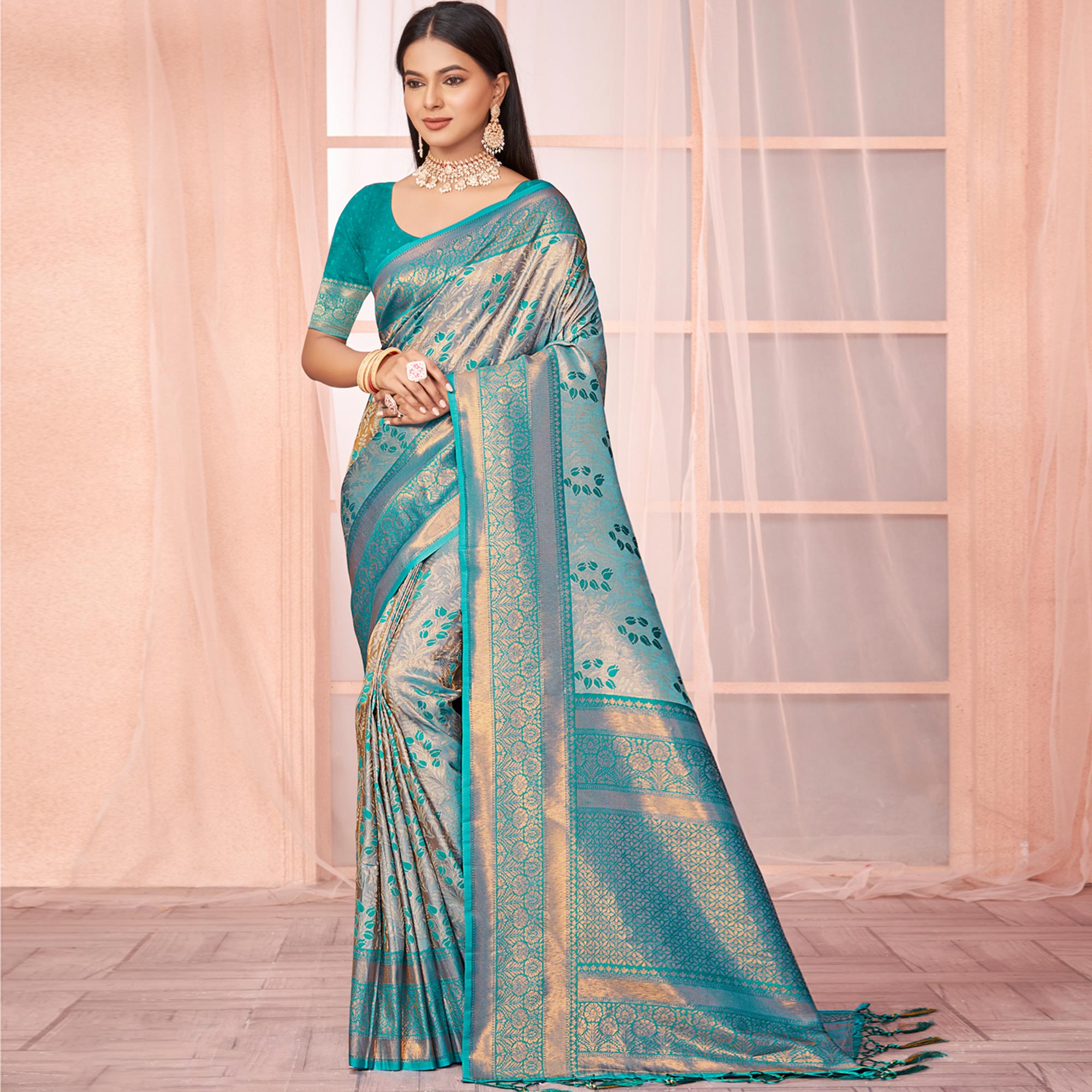 Turquoise Floral Woven Kanjivaram Silk Saree With Tassels