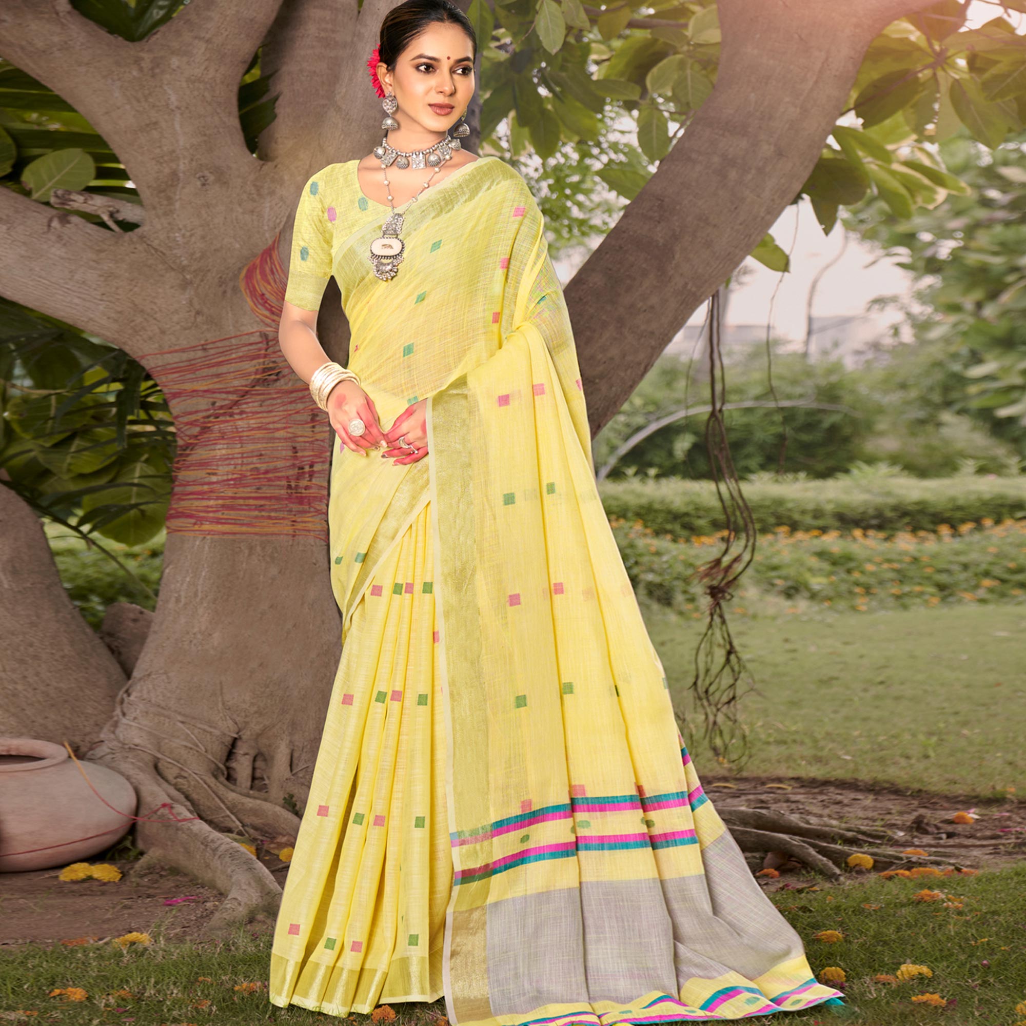 Yellow Woven Cotton Blend Saree With Tassels