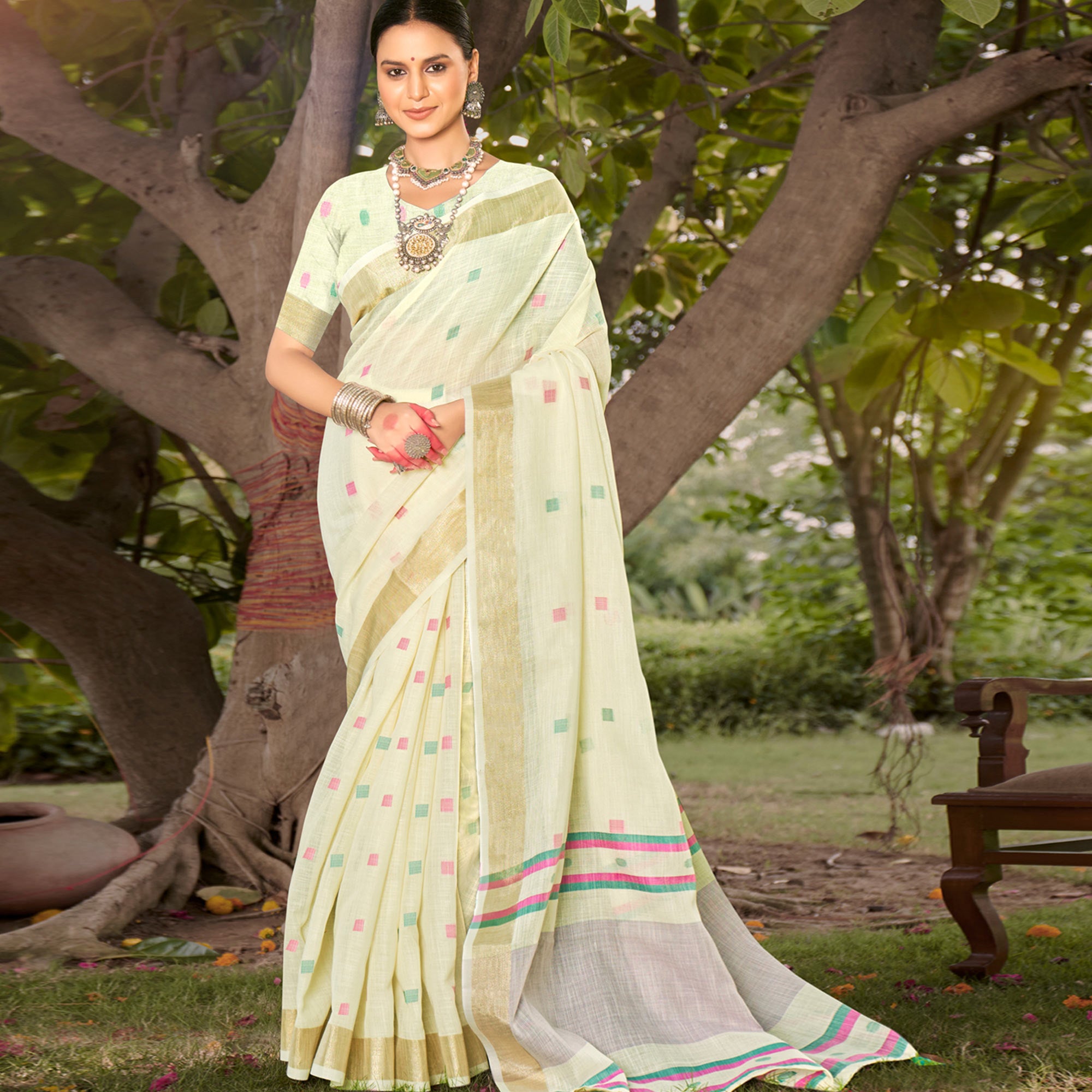 Cream Woven Cotton Blend Saree With Tassels