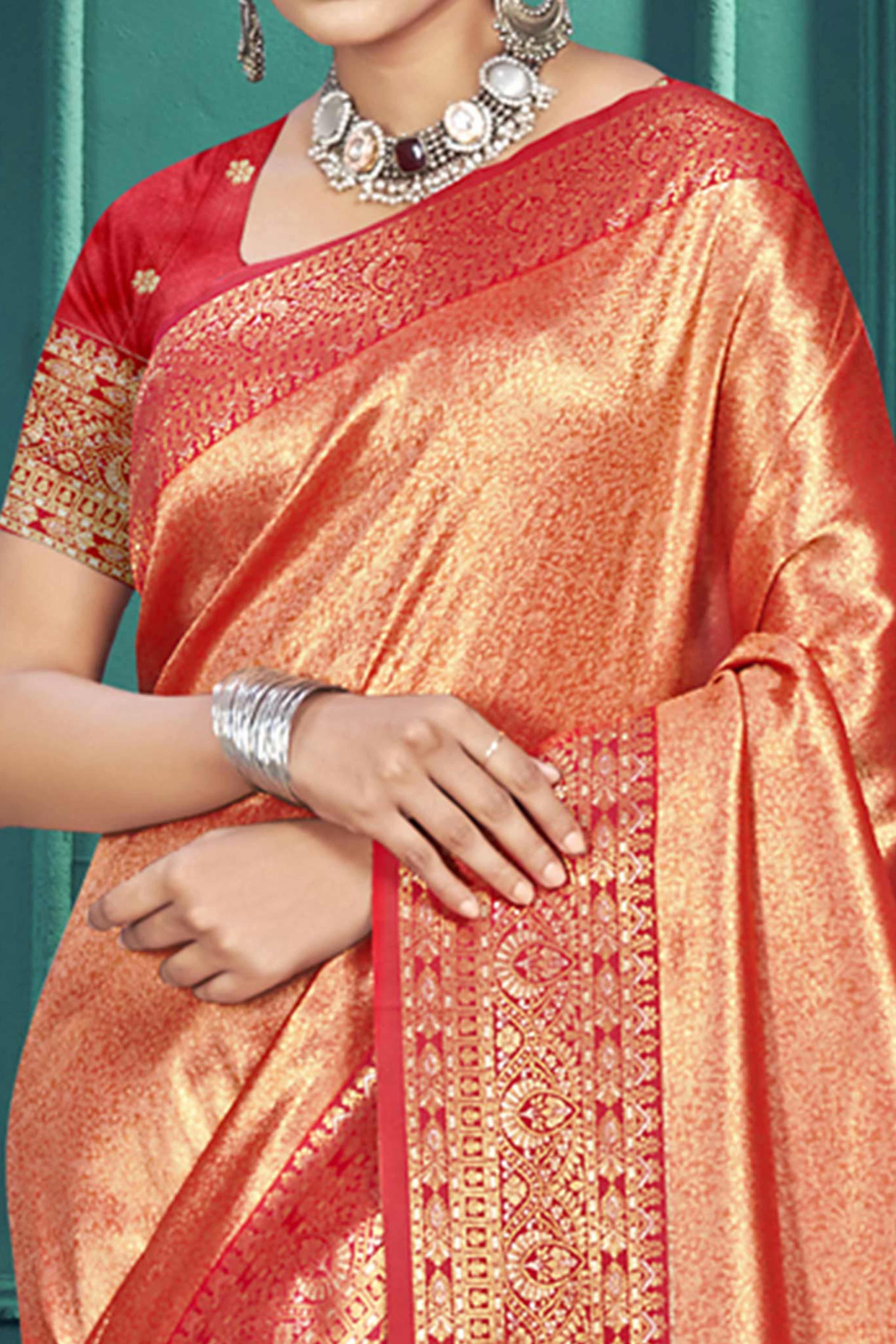 Exclusive Orange Floral Motif Woven Kanjivaram Silk Saree With Graceful Tassel Pallu