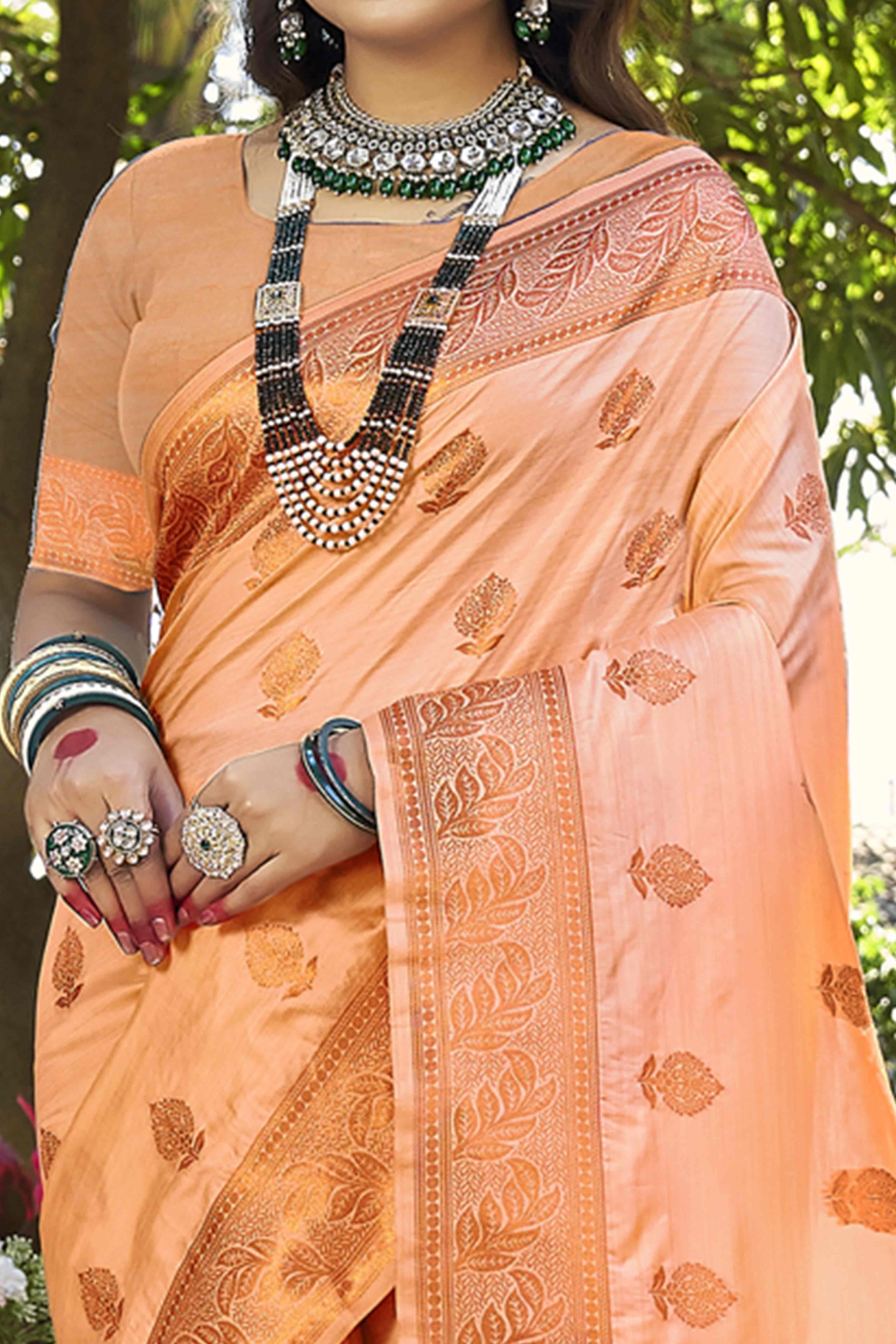 Graceful Emerald Floral Zari Woven Banarasi Silk Saree In Peach