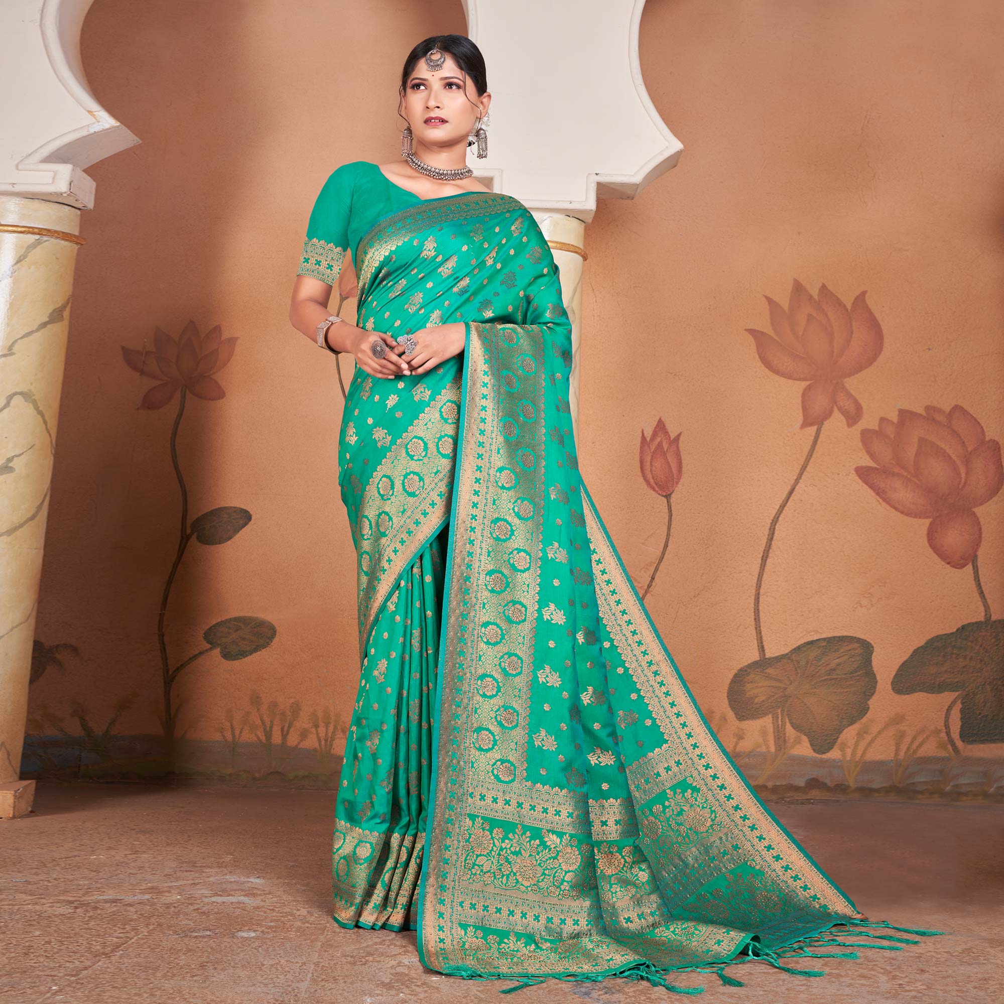 Rama Green Floral Woven Banarasi Silk Saree With Tassels