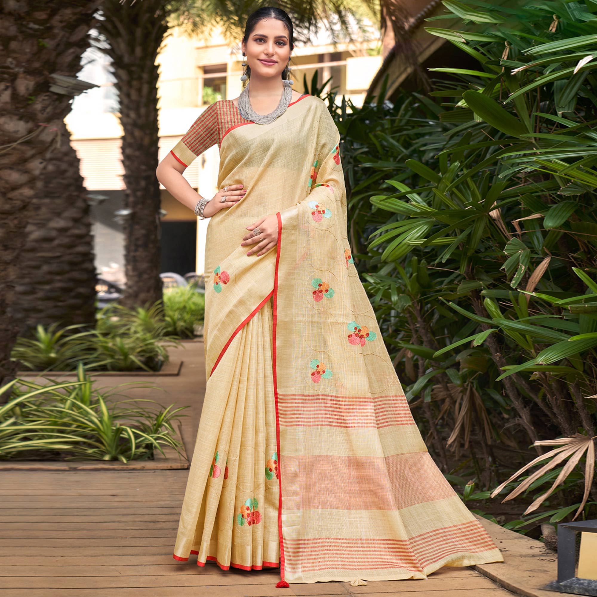 Beige Floral Embroidered Linen Saree With Tassels