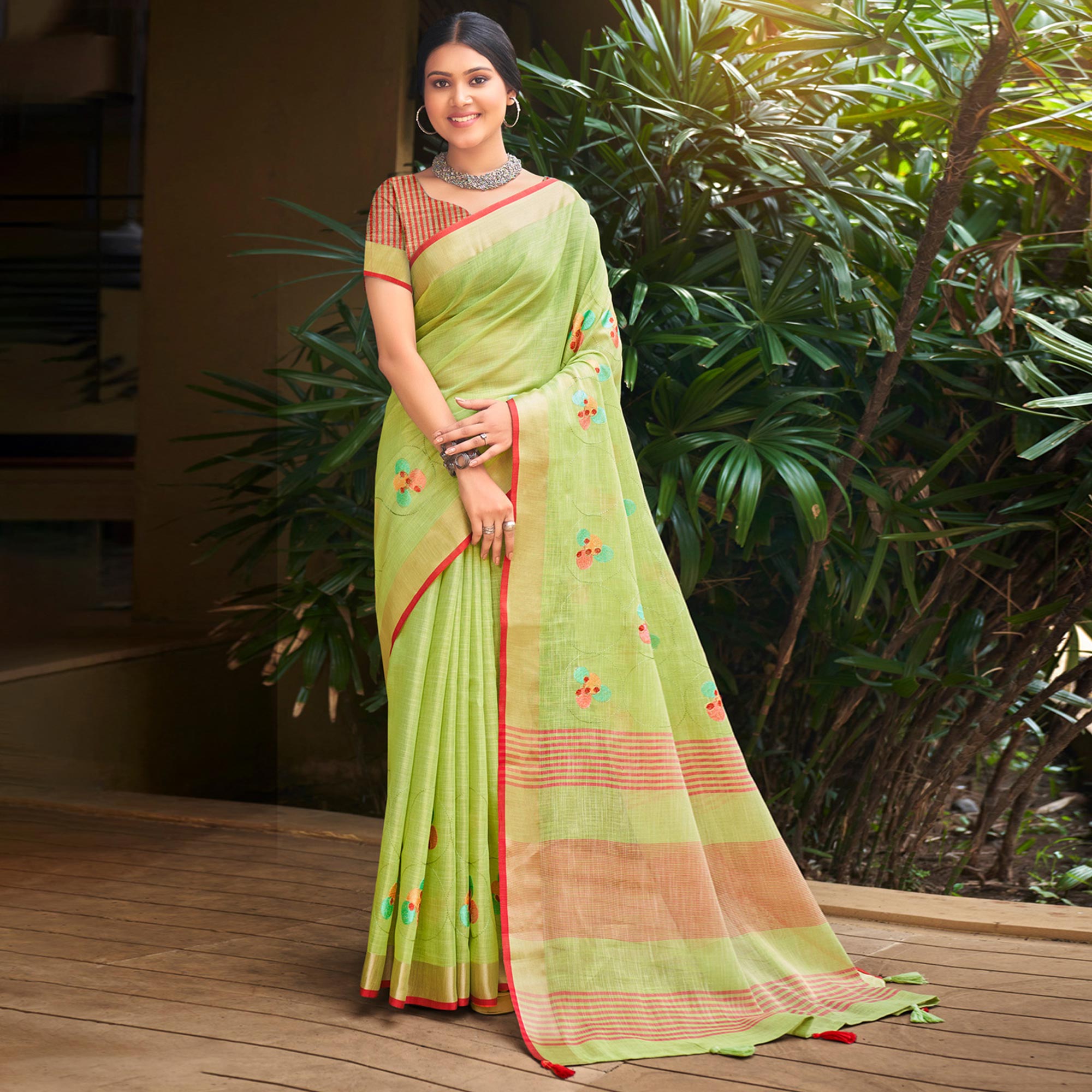 Green Floral Embroidered Linen Saree With Tassels