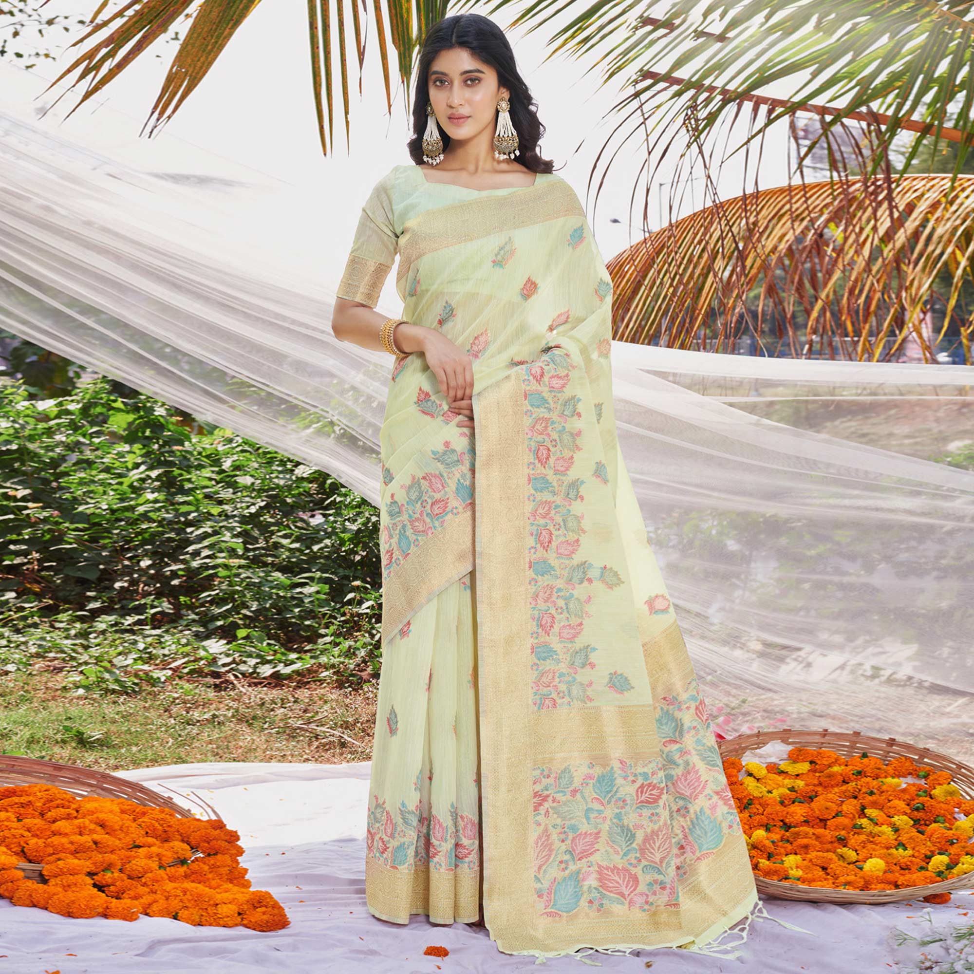 Mint Green Floral Woven Cotton Silk Saree With Tassels