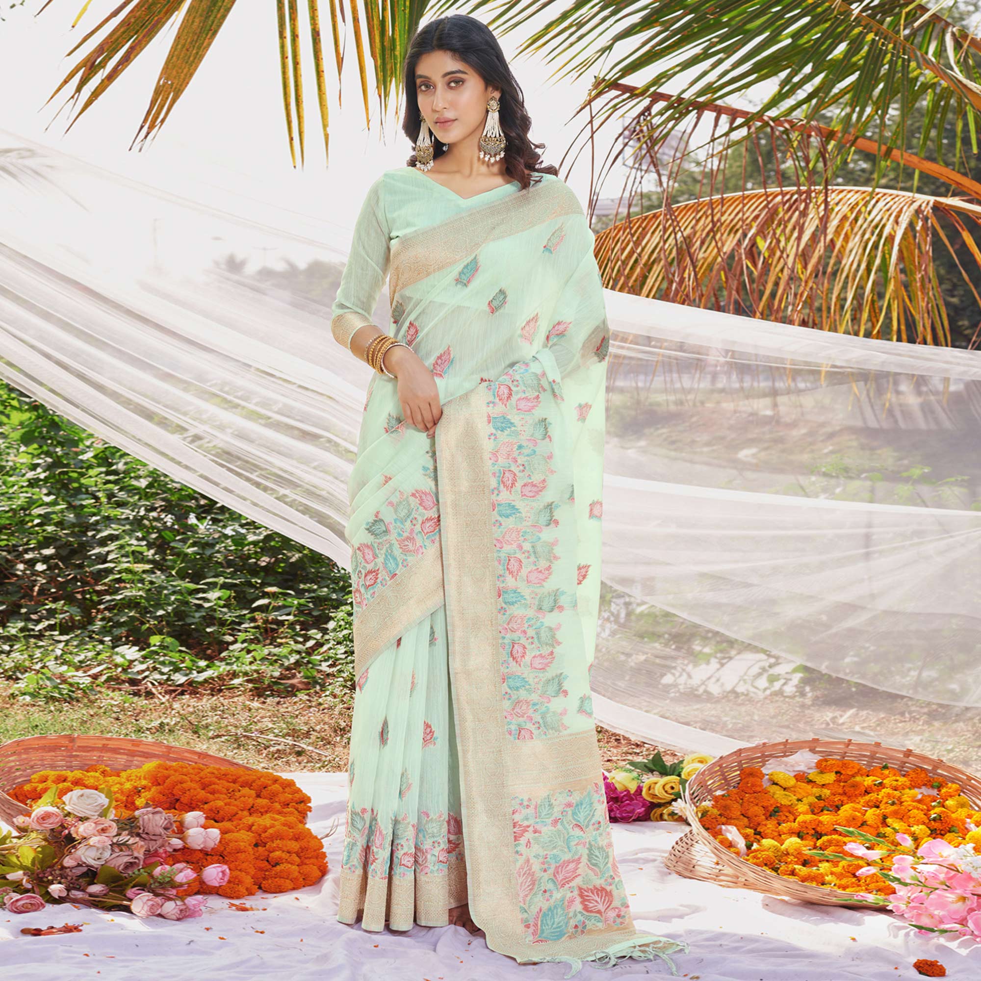 Sea Green Floral Woven Cotton Silk Saree With Tassels