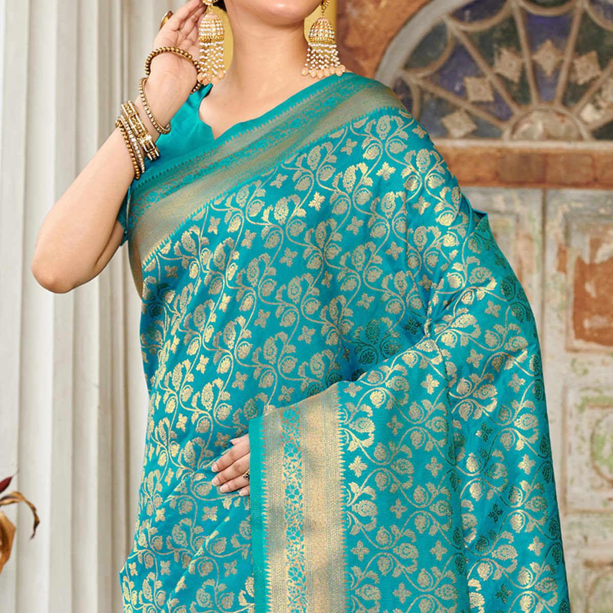 Turquoise Floral Woven Banarasi Silk Saree With Tassels