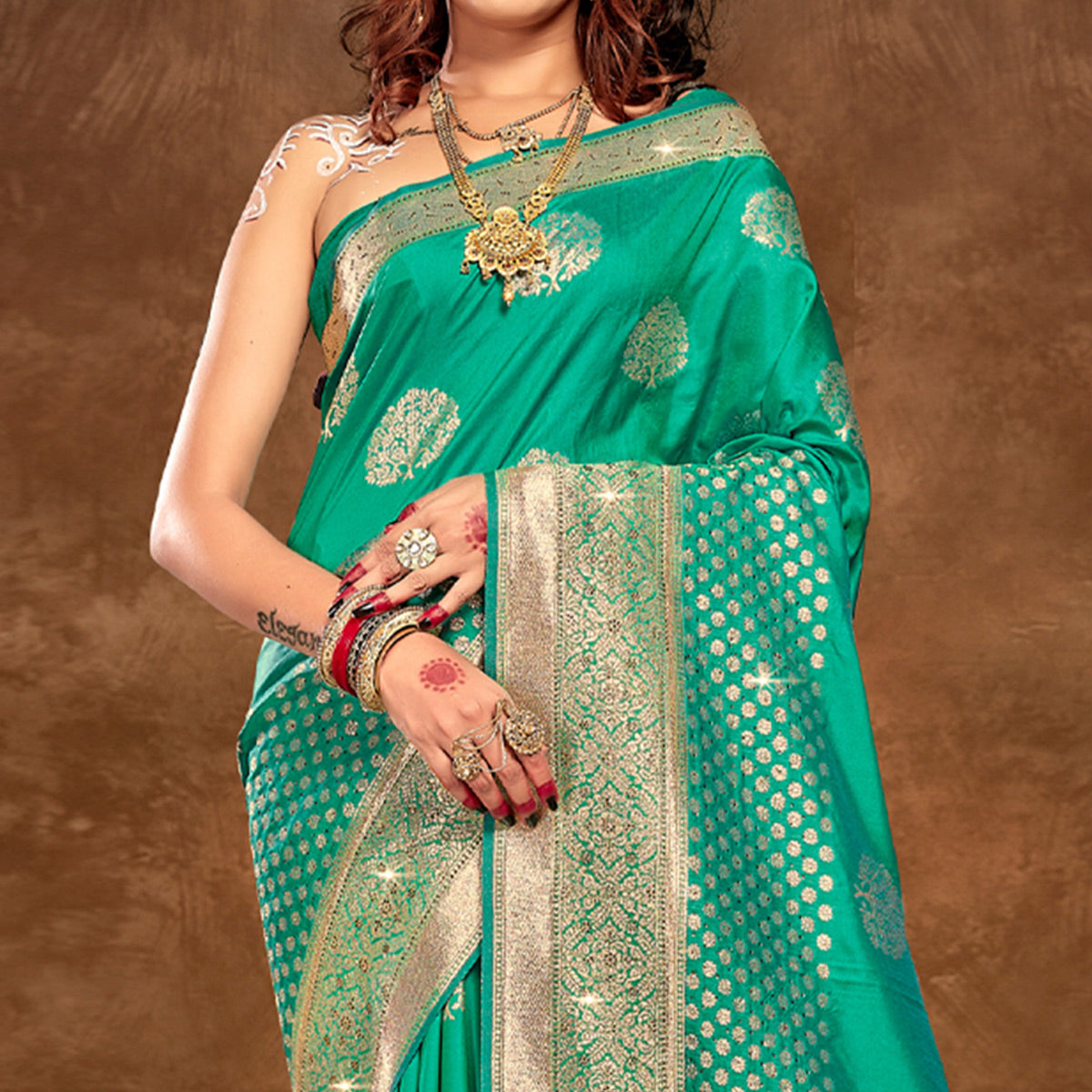 Turquoise Floral Woven Banarasi Silk Saree With Tassels