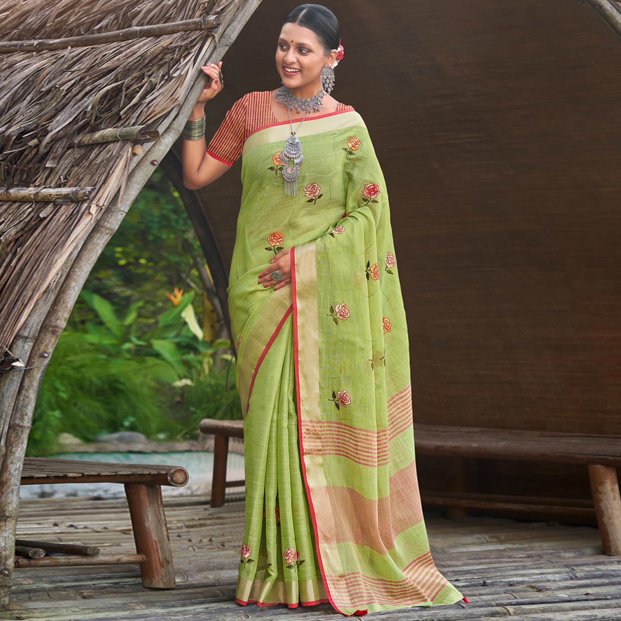 Green Floral Embroidered Linen Saree With Tassels