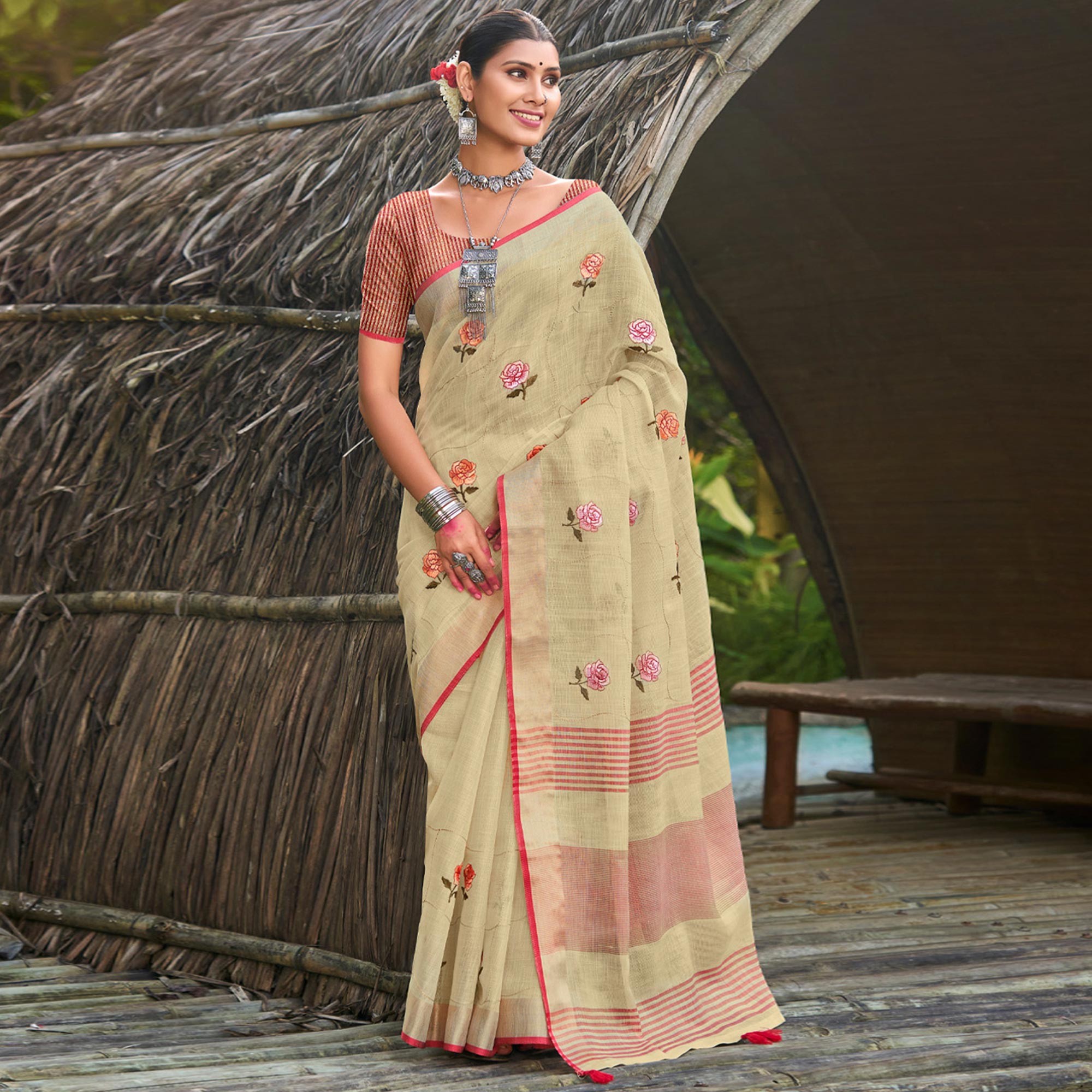 Beige Floral Embroidered Linen Saree With Tassels