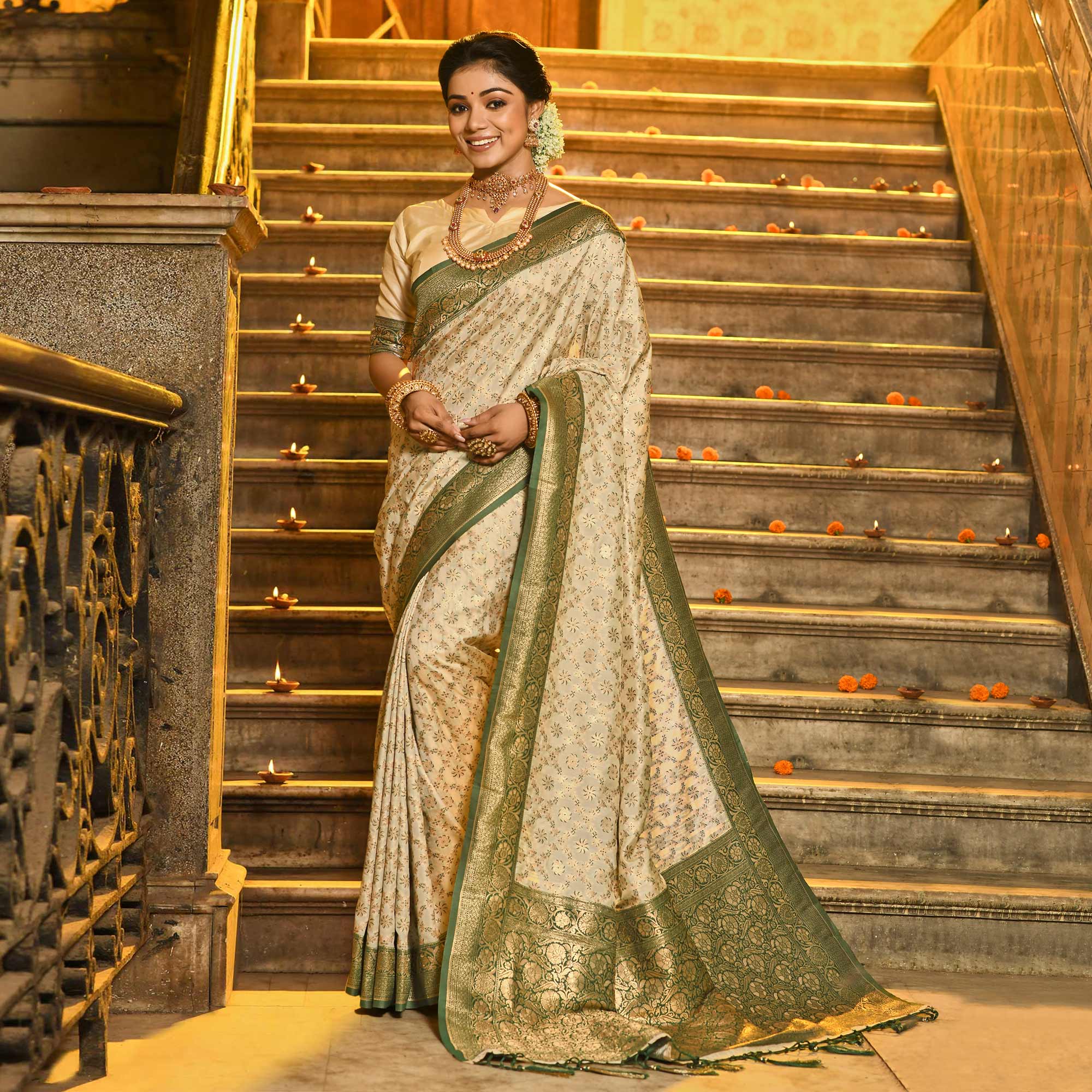 Cream & Green Floral Woven Banarasi Silk Saree With Tassels