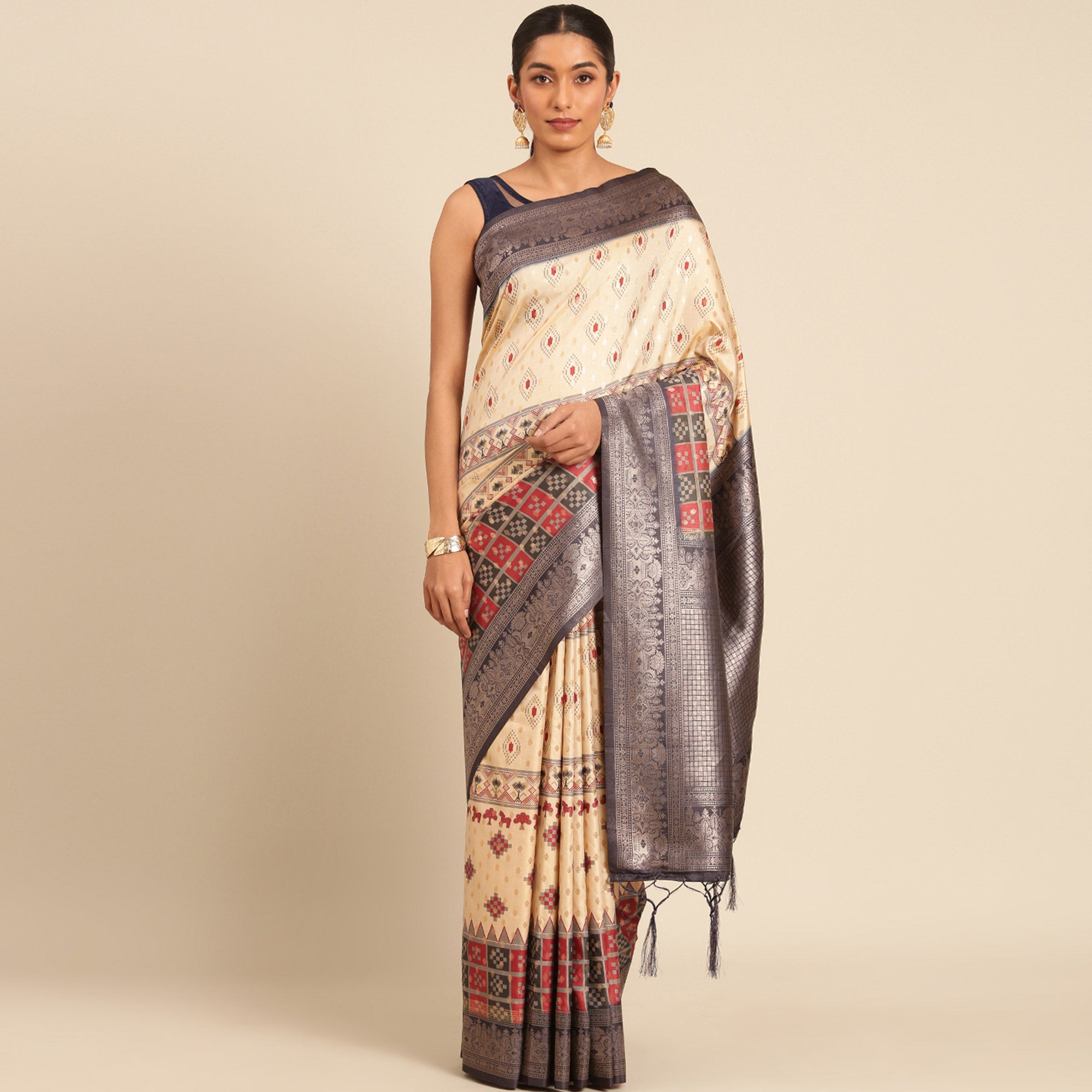 Cream Woven Banarasi Silk Saree With Tassels