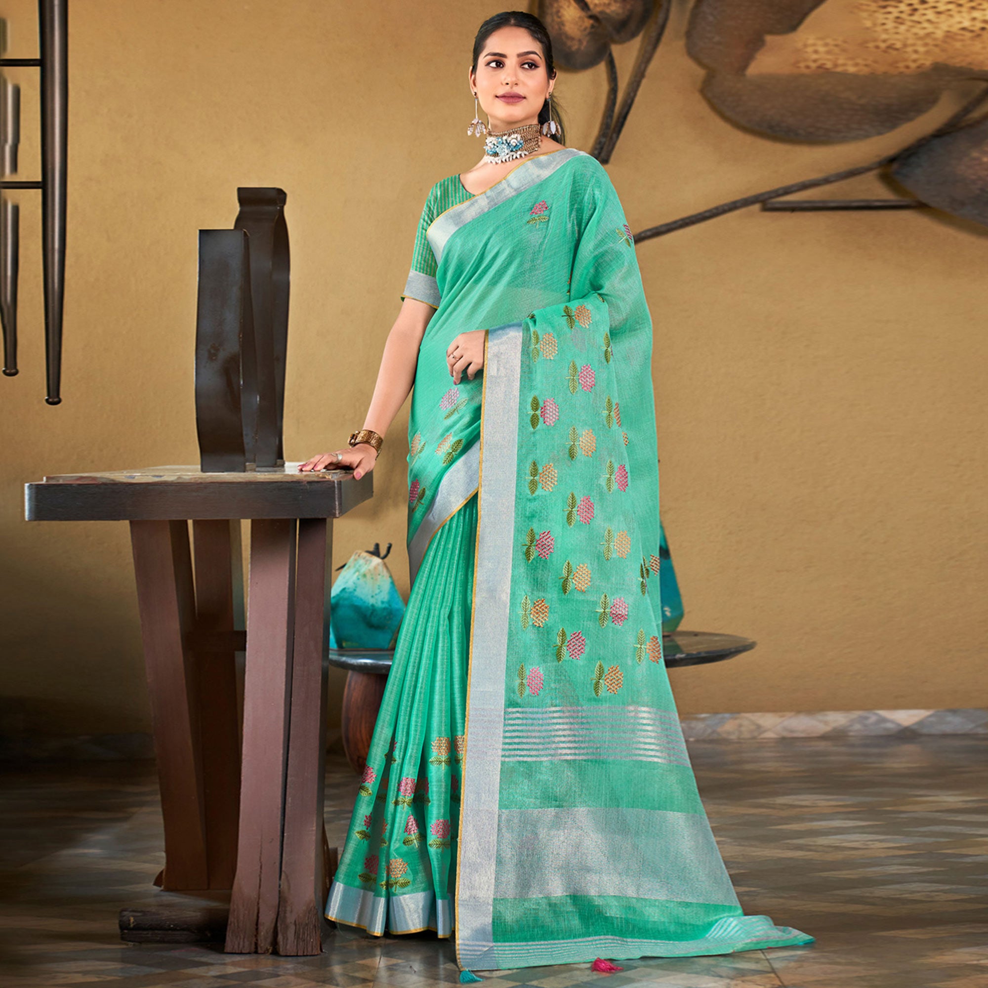Sea Green Floral Embroidered Linen Saree With Tassels
