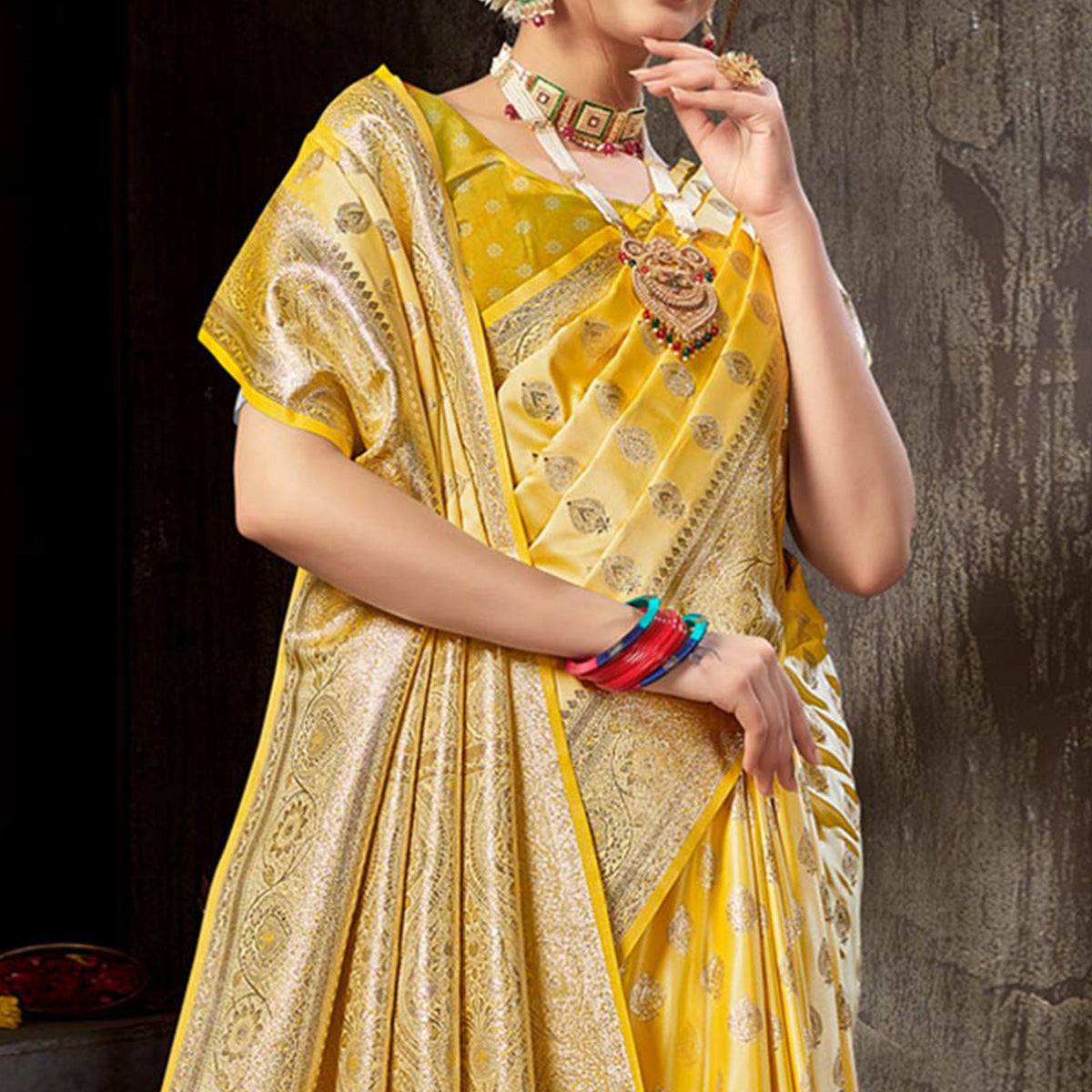 Yellow Woven Banarasi Silk Saree With Tassels