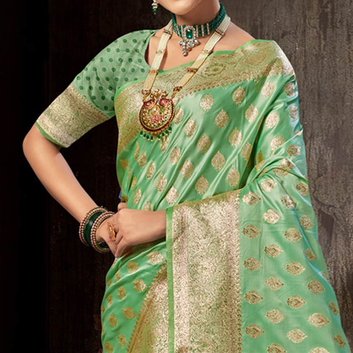 Green Woven Banarasi Silk Saree With Tassels