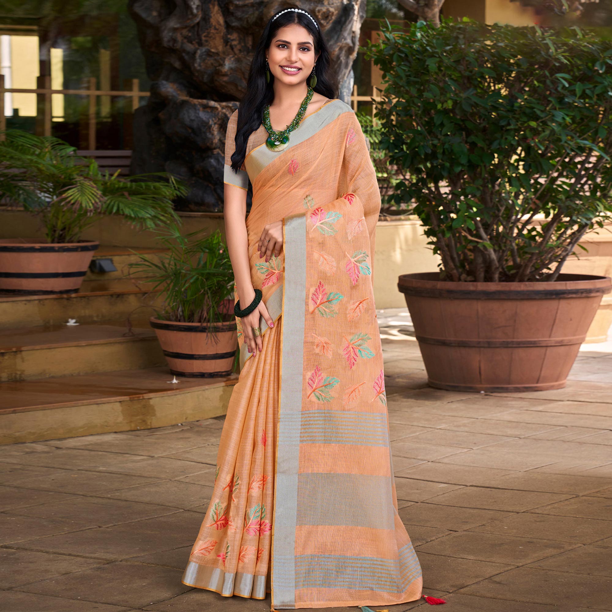 Orange Floral Embroidered Linen Saree With Tassels