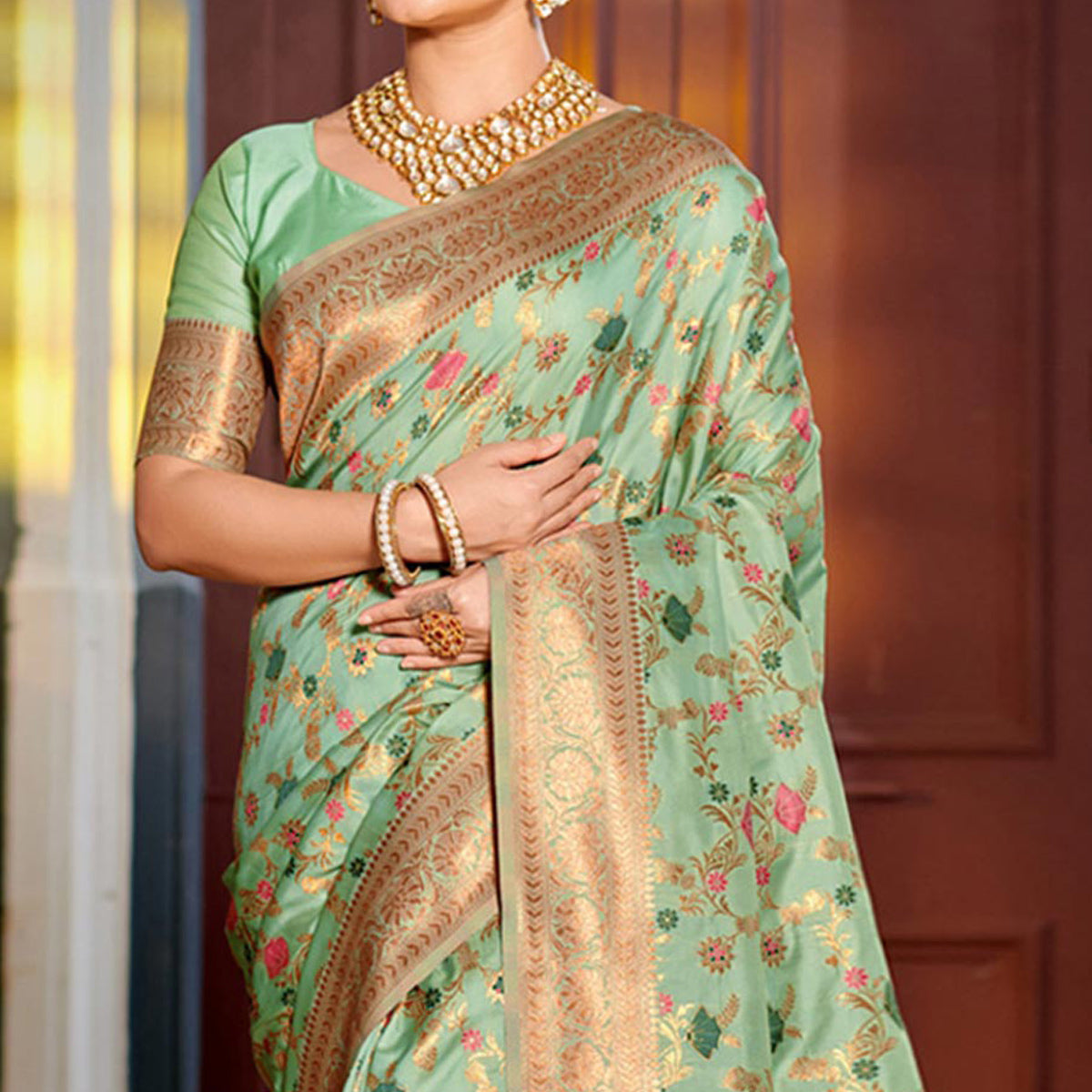 Sea Green Floral Woven Banarasi Silk Saree With Tassels