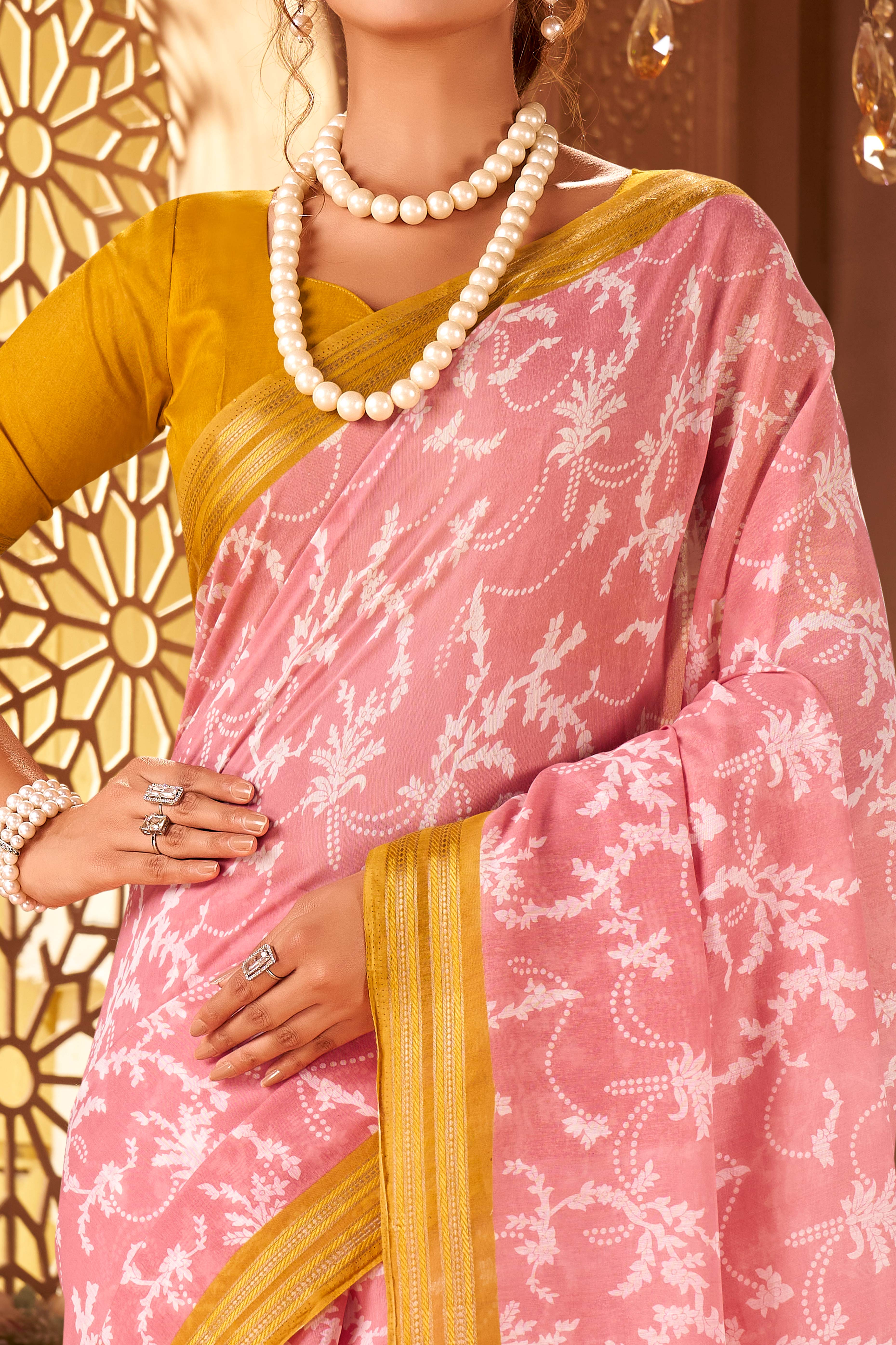 Sophisticated Baby Pink Mulmul Cotton Saree Featuring Delicate Floral Prints & Weaving Border