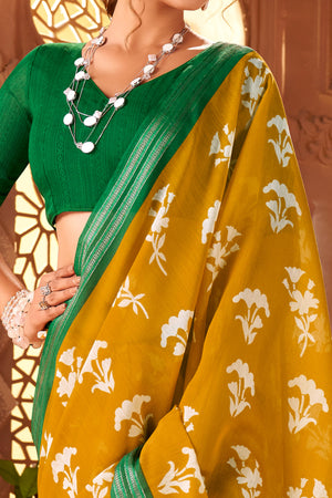 Sophisticated Mustard Mulmul Cotton Saree Featuring Delicate Floral Prints & Weaving Border