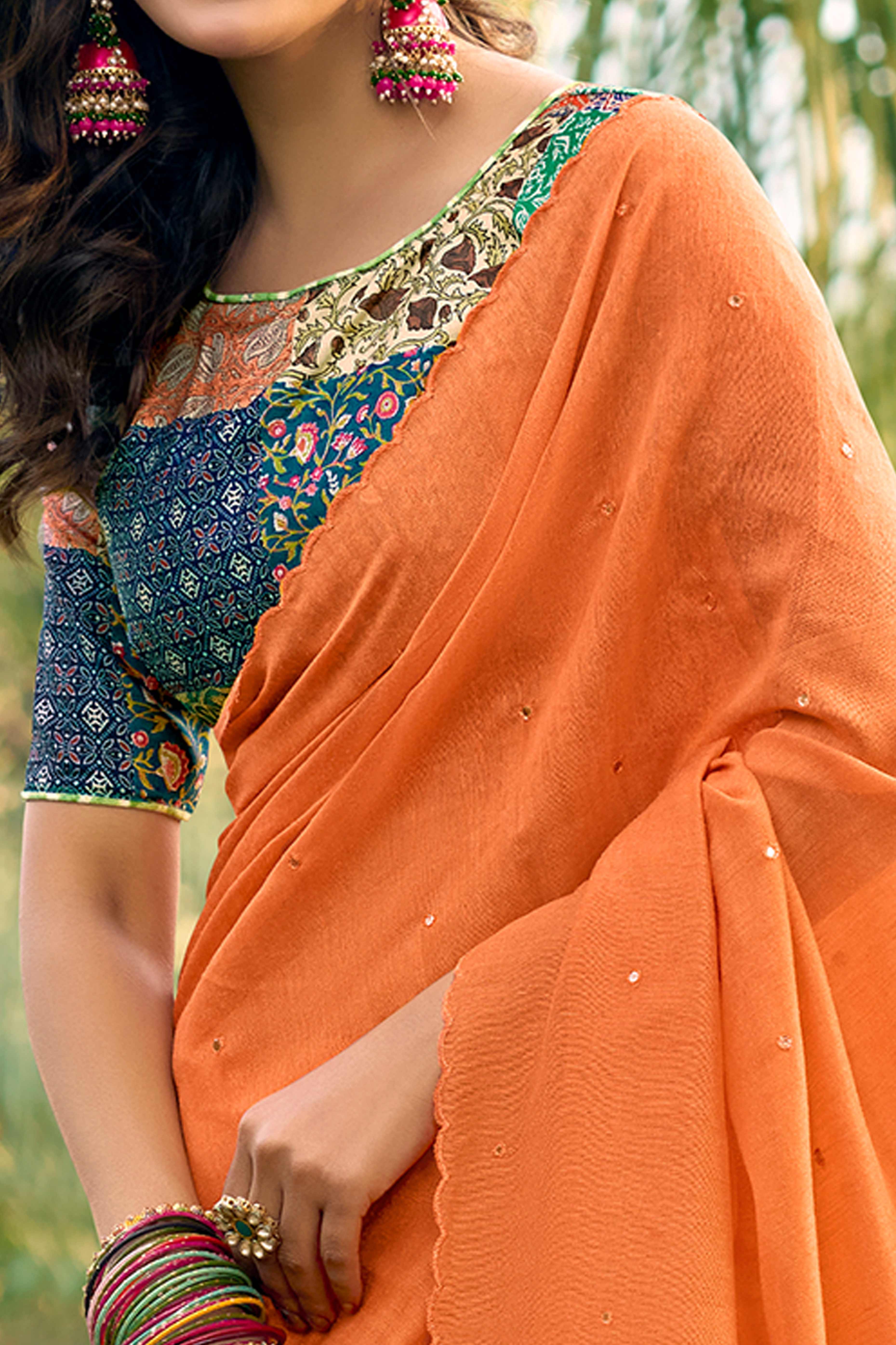 Timeless Orange Cotton Blend Drape Highlighted With Shimmering Mirror Embroidery Work