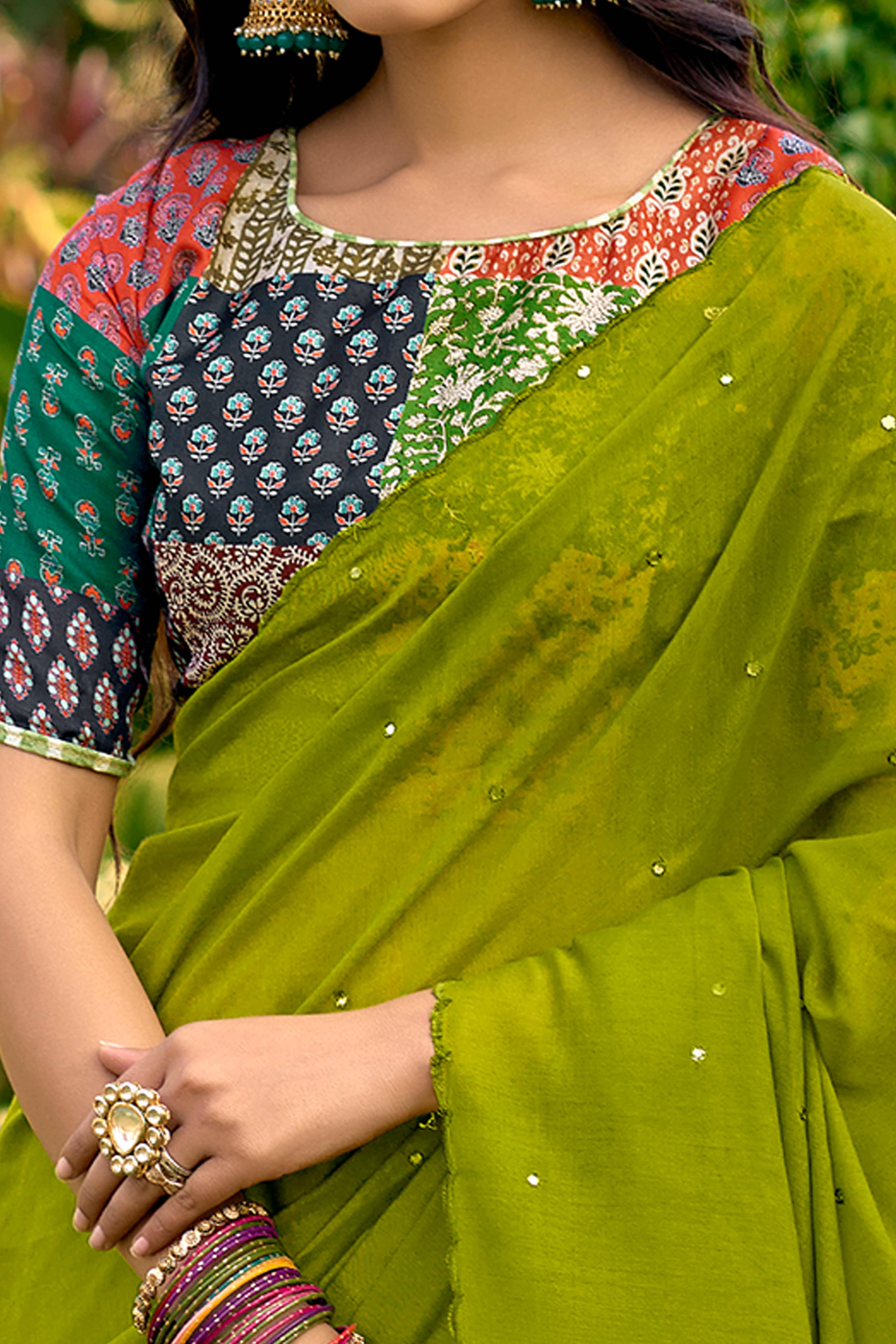 Timeless Green Cotton Blend Drape Highlighted With Shimmering Mirror Embroidery Work