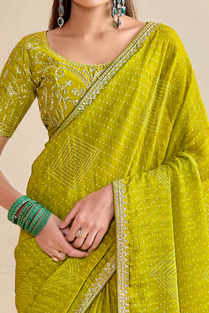 Lime Green Bandhani Printed Charm In Georgette With Sparkling Sequin Embroidered Border