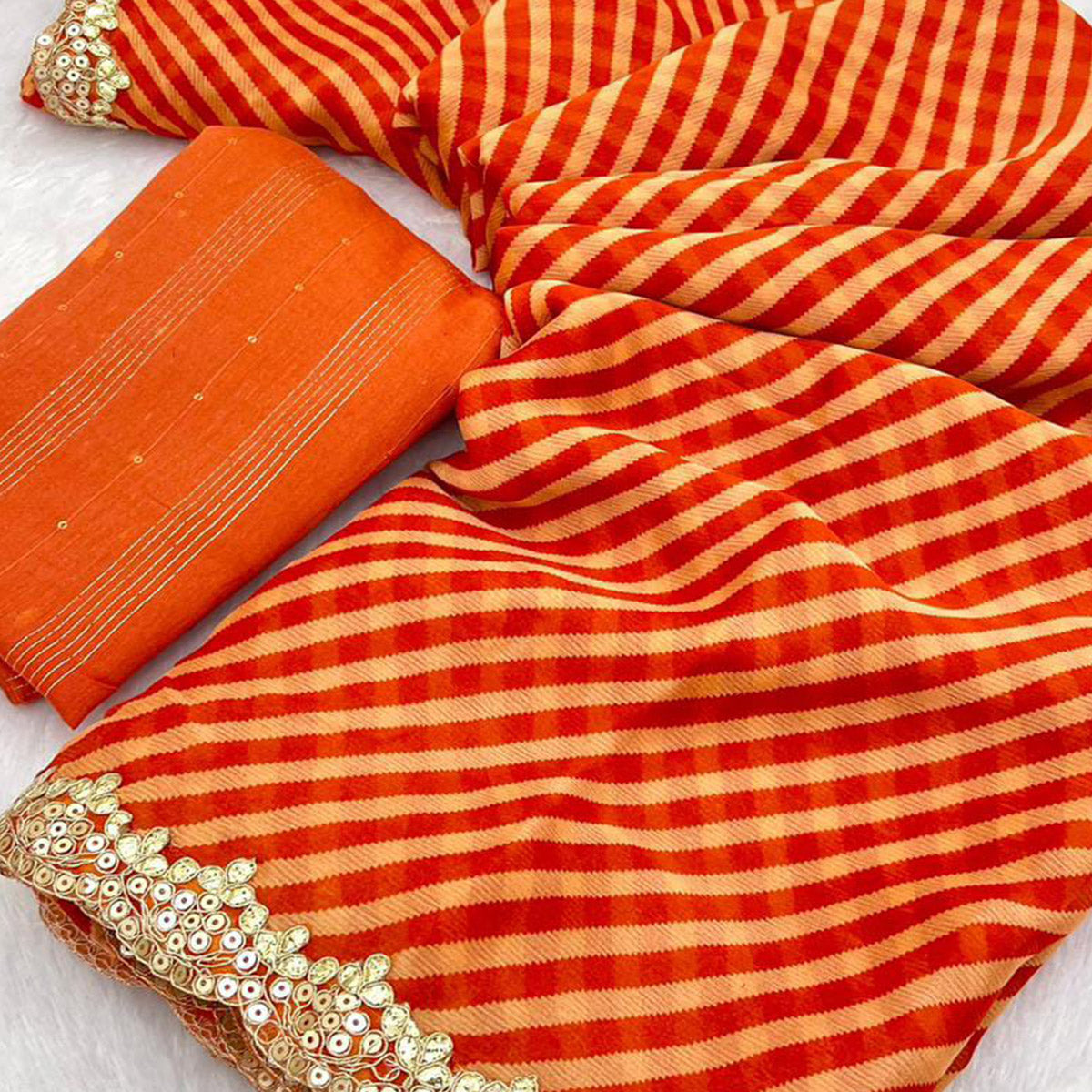 Orange Striped Printed Chiffon Saree With Sequins Embroidered Border