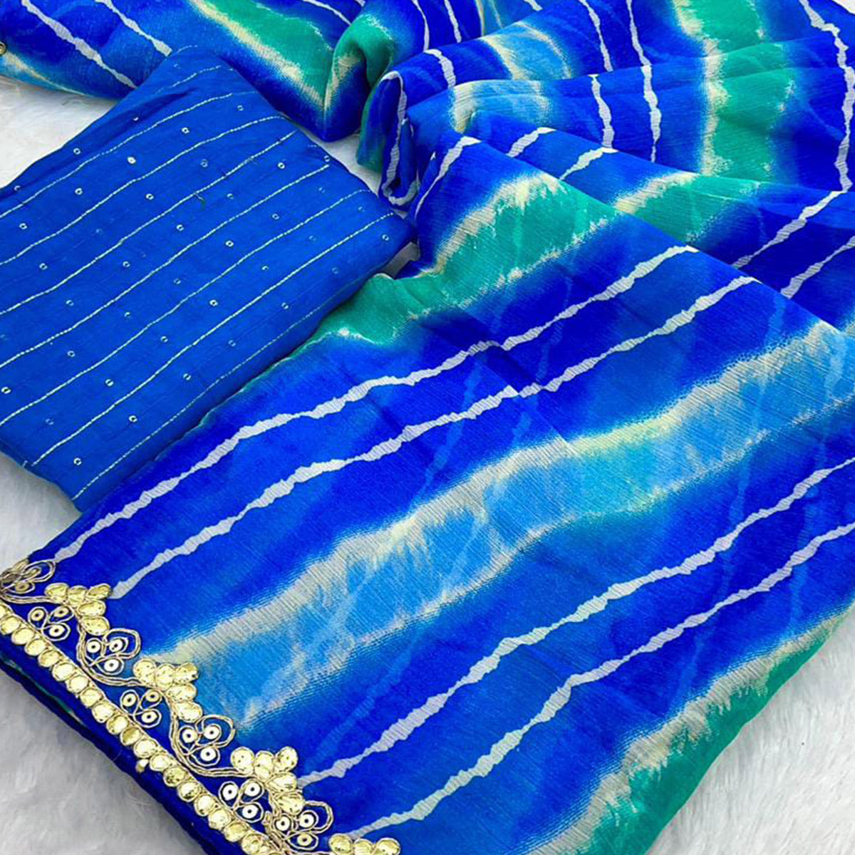 Blue Leheriya Printed Chiffon Saree With Sequins Embroidered Border