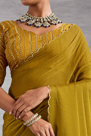 Mustard Solid Organza Jimmy Choo Saree Accentuated With Elegant Cutwork Border Detailing