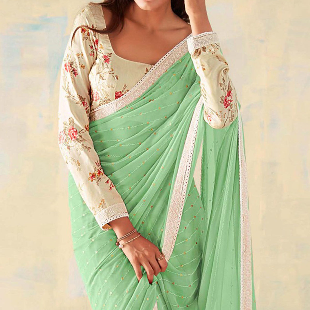 Sea Green Foil Printed Georgette Saree With Embroidered Border